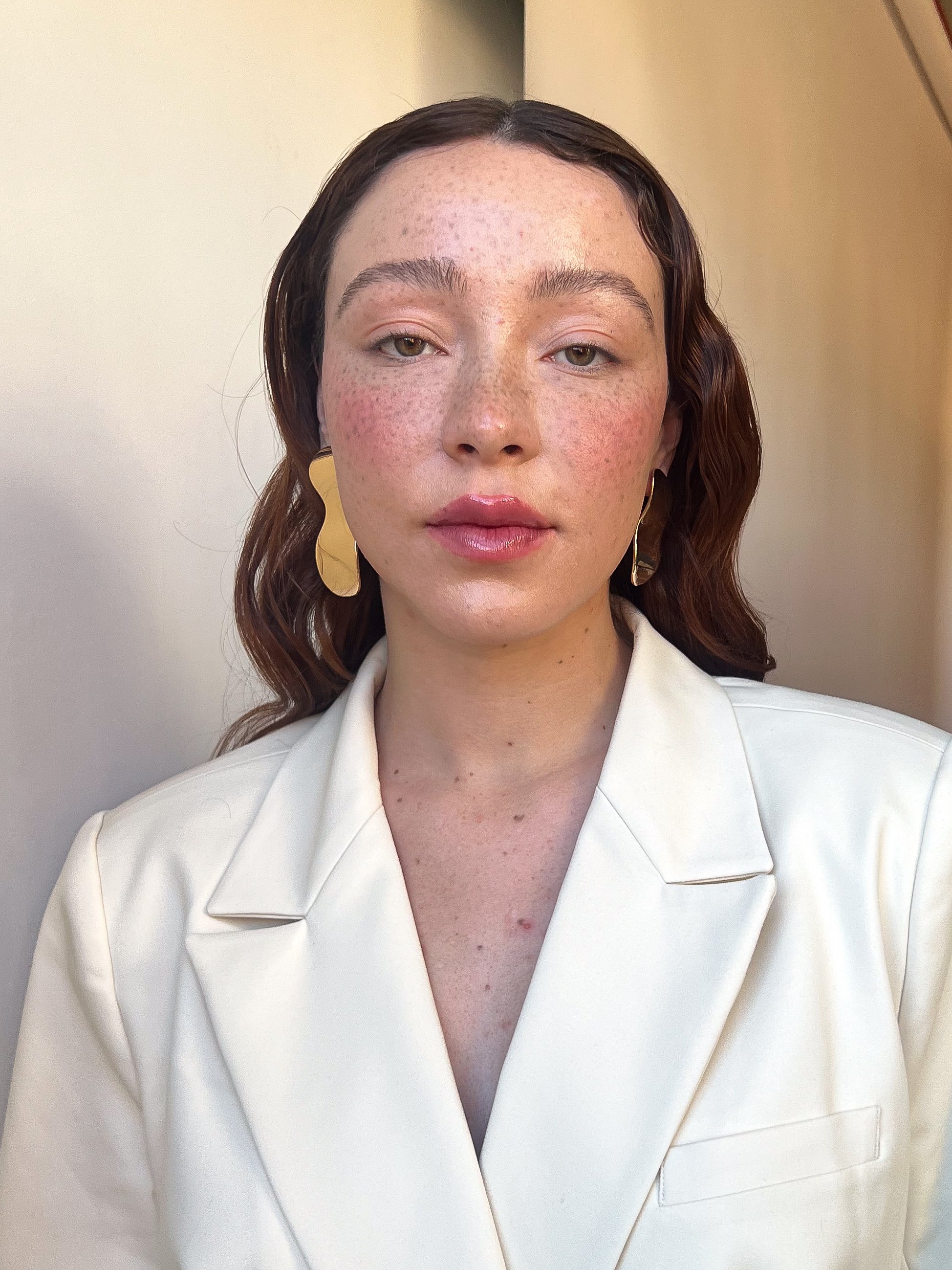 Polished makeup look behind the scenes for a photoshoot.