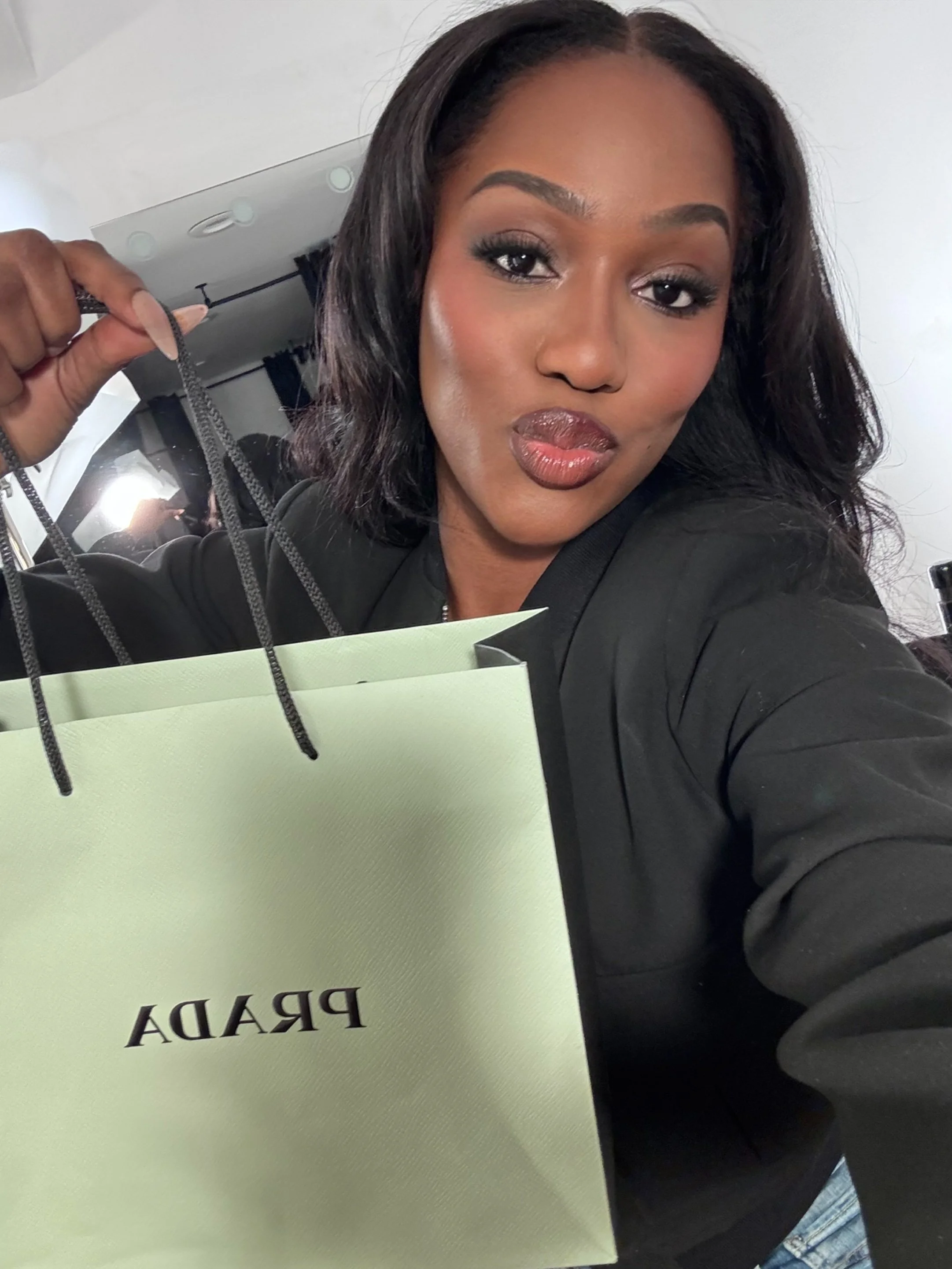 Makeup Artist On-set with her Prada Gift Bag.