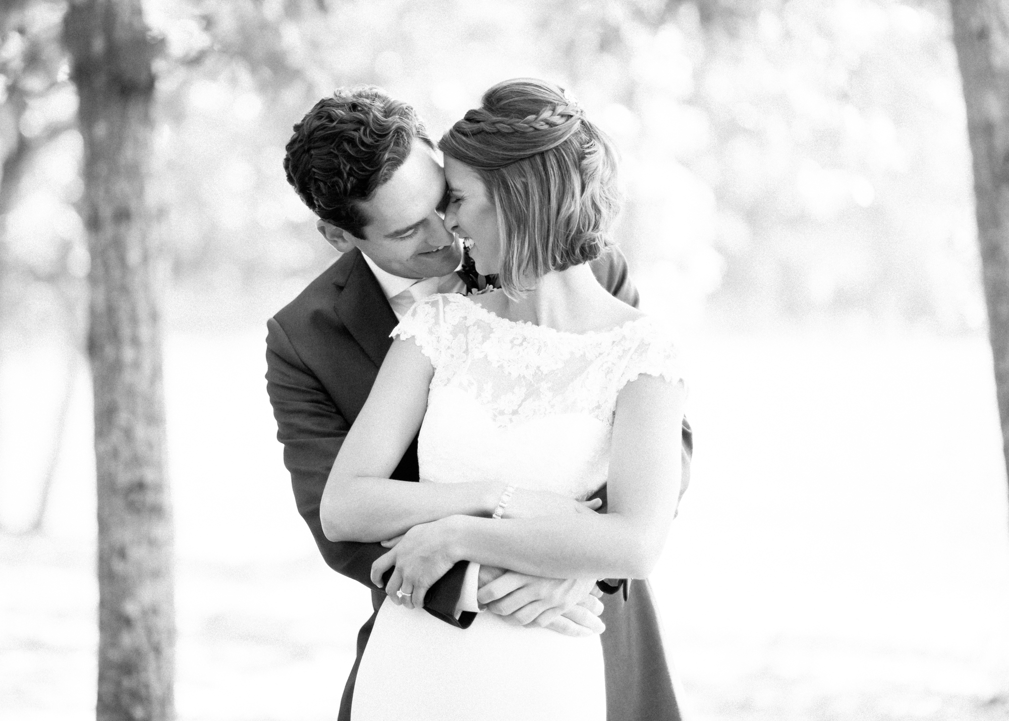 bride and groom in black and white