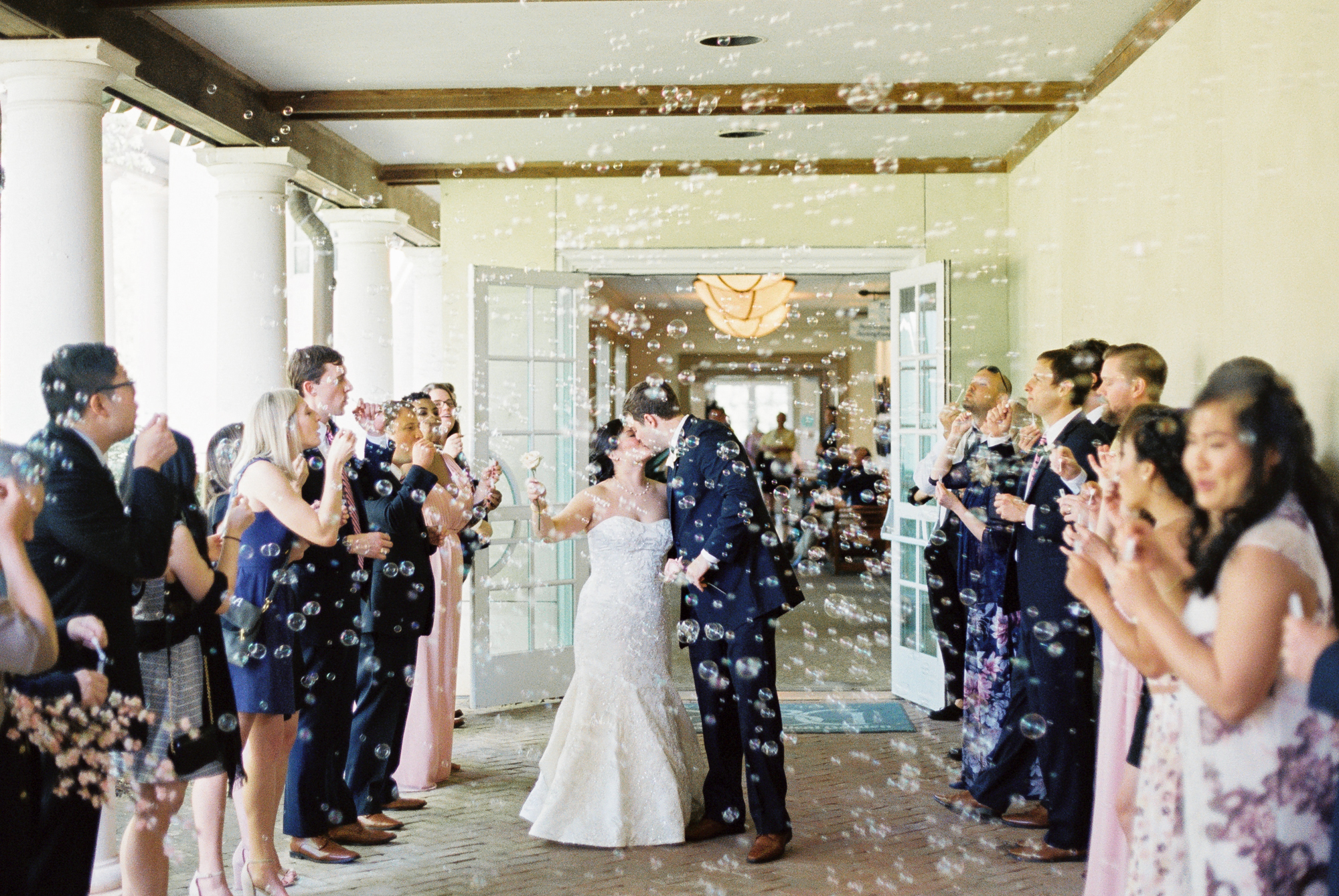 bride and groom bubble exit