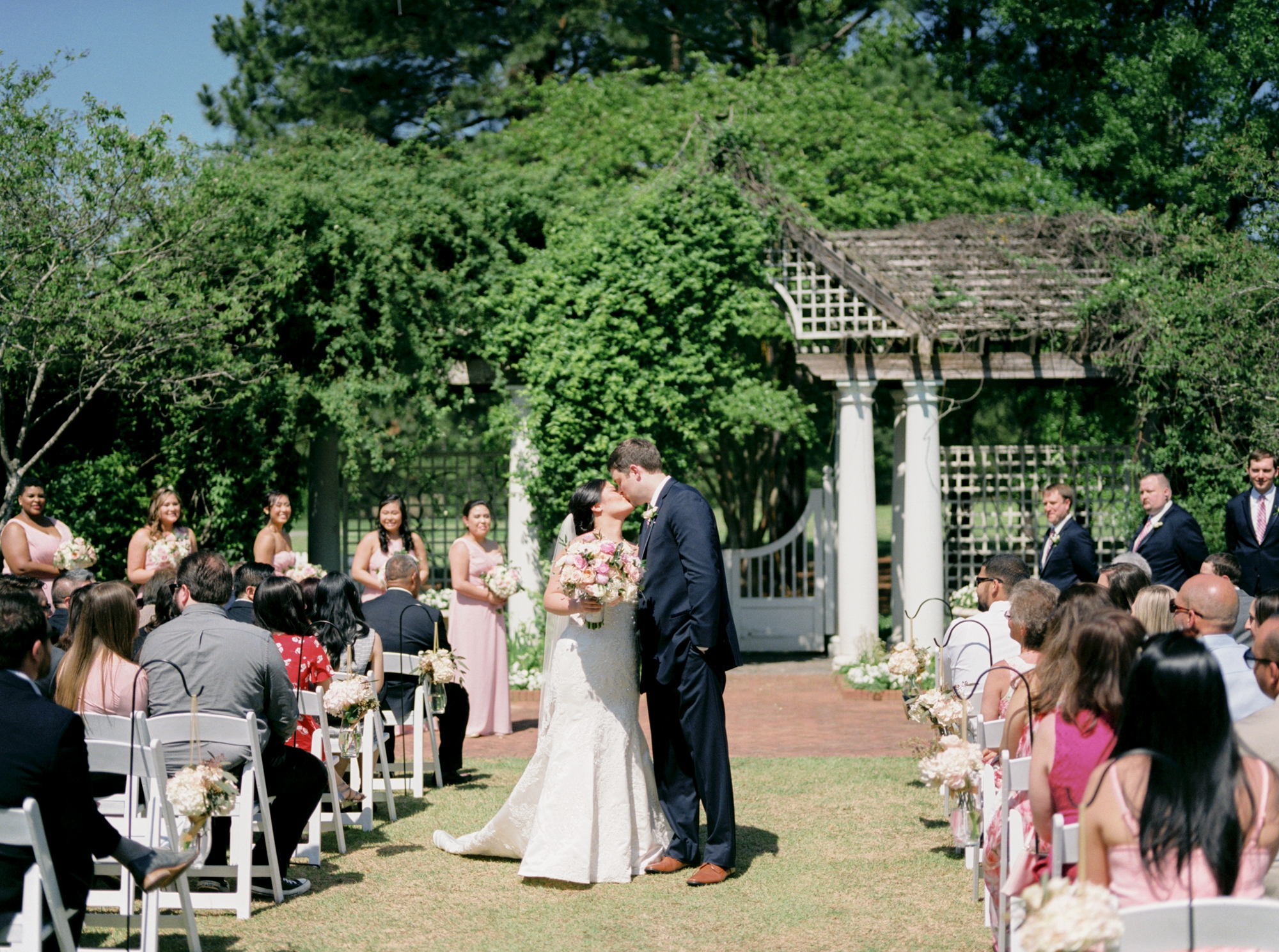 bride and groom first kiss charlotte wedding