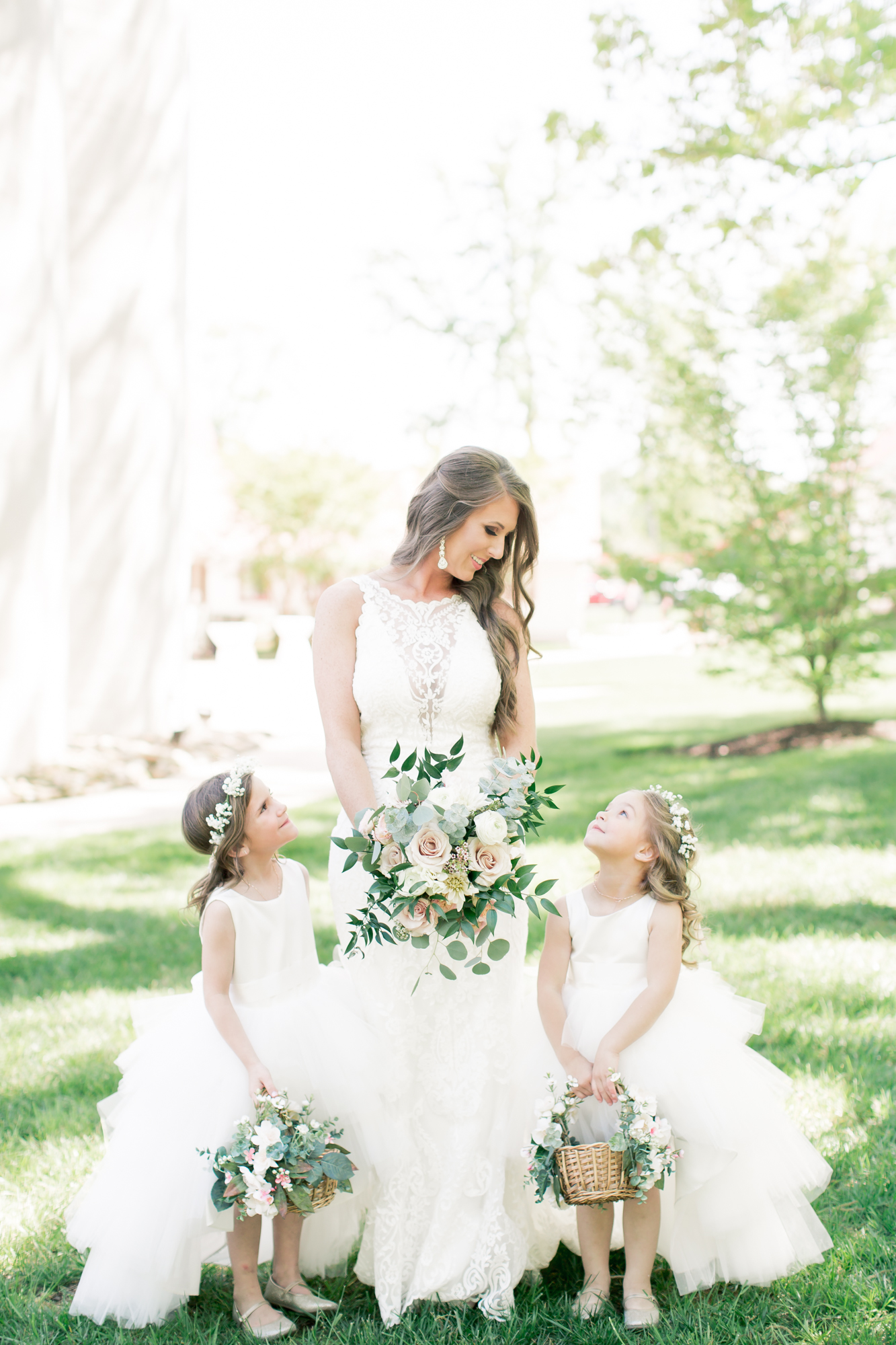 bride with flower girls