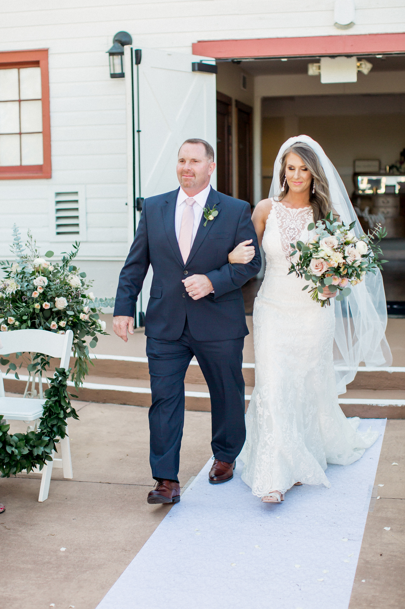 dad walking daughter down aisle