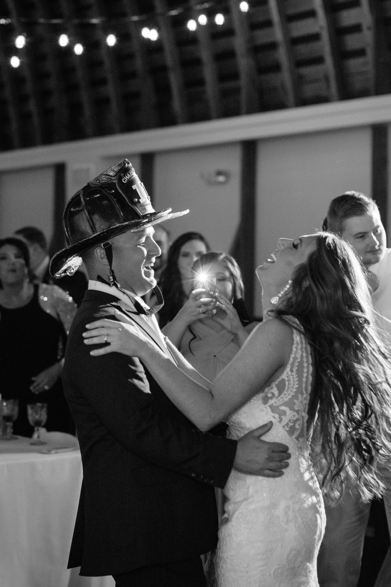 groom firefighter with bride