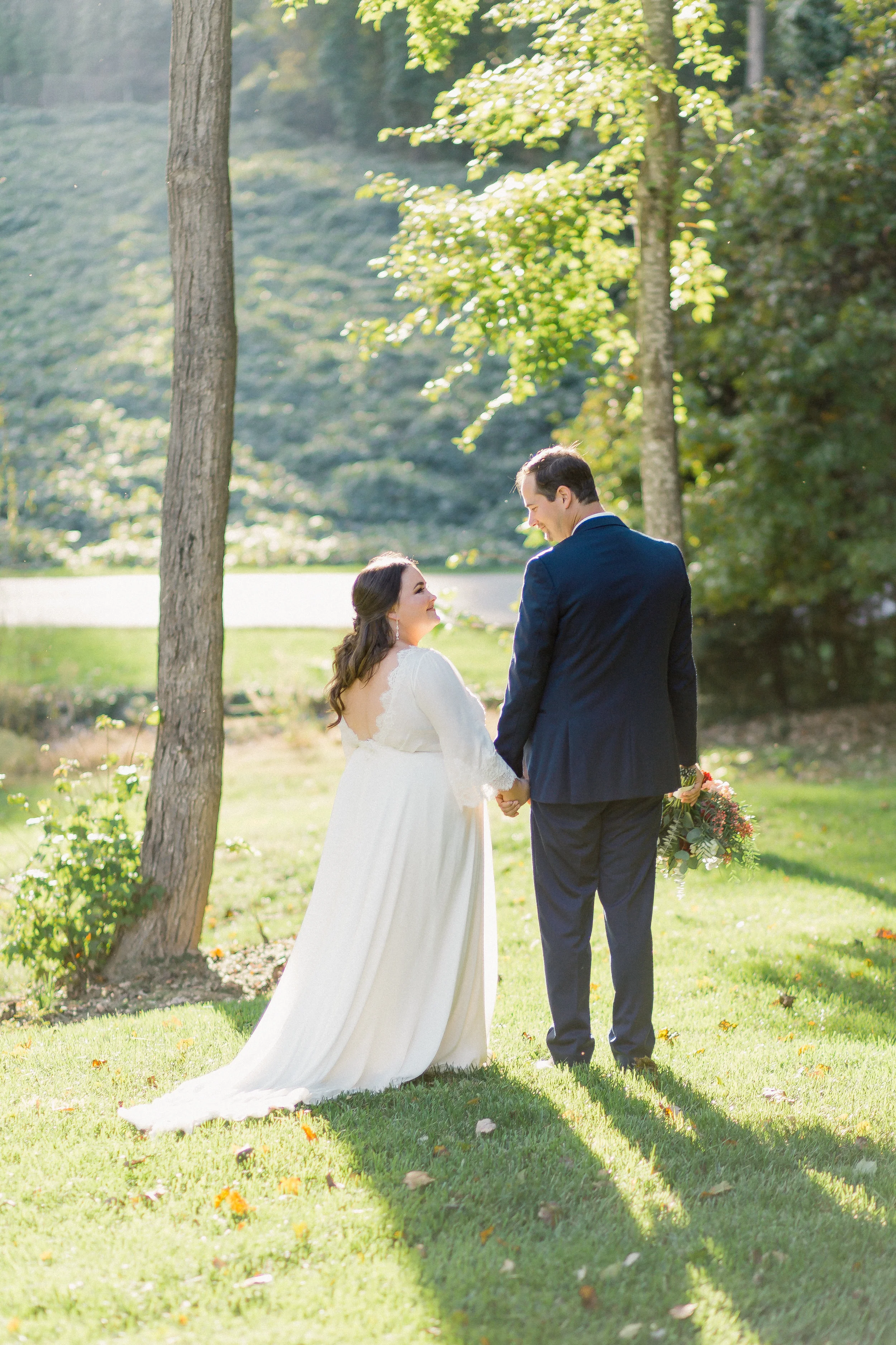 bride and groom at johnson carriage house