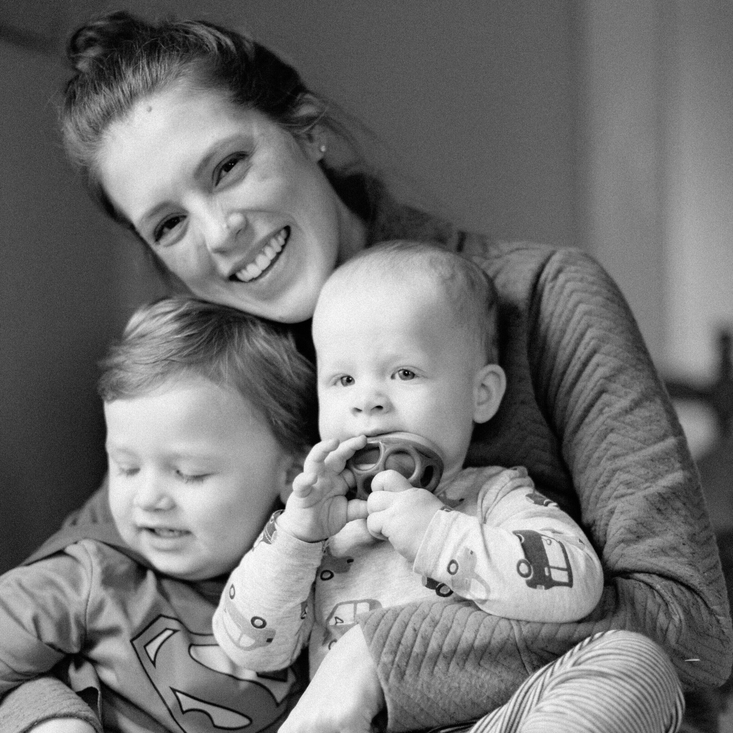 mom and her boys photo in black and white