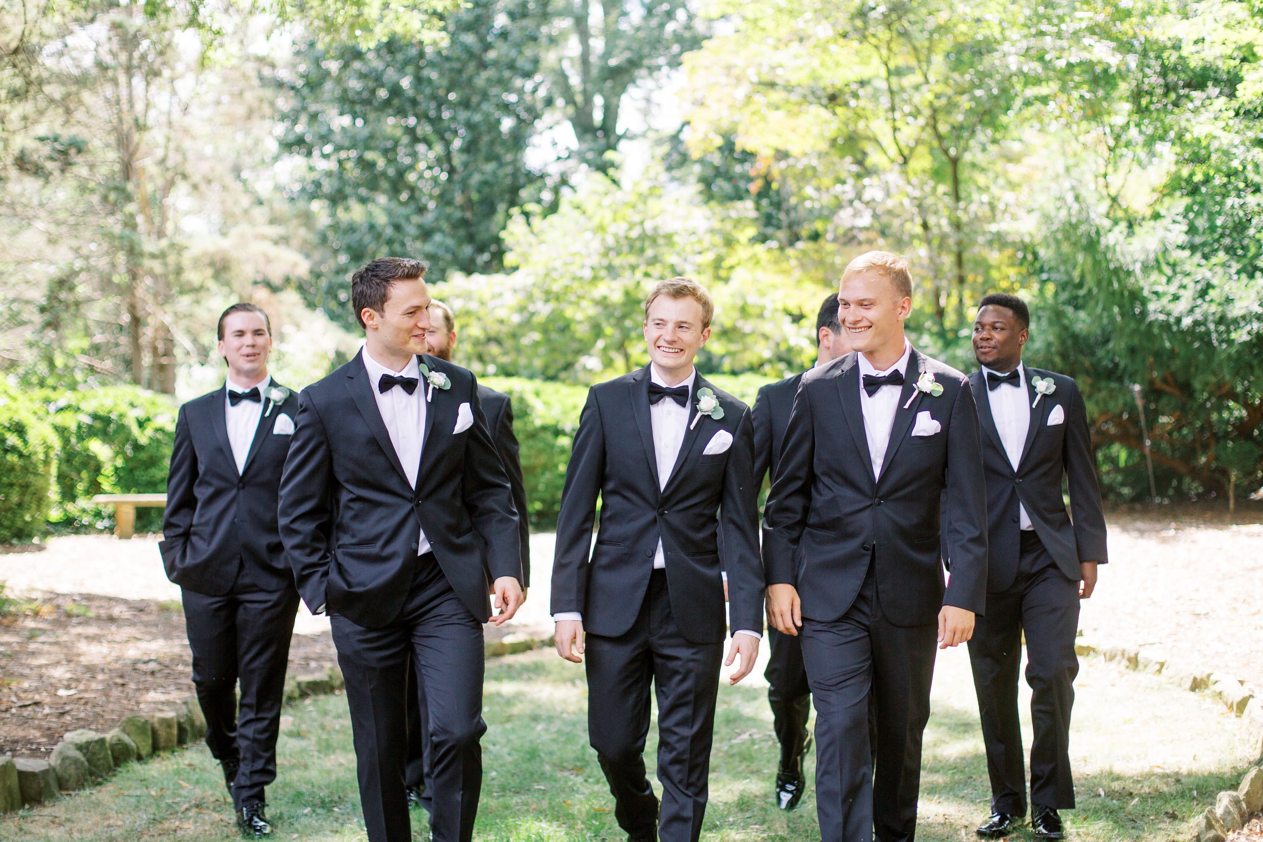 Groom and Groomsmen Walking Photo