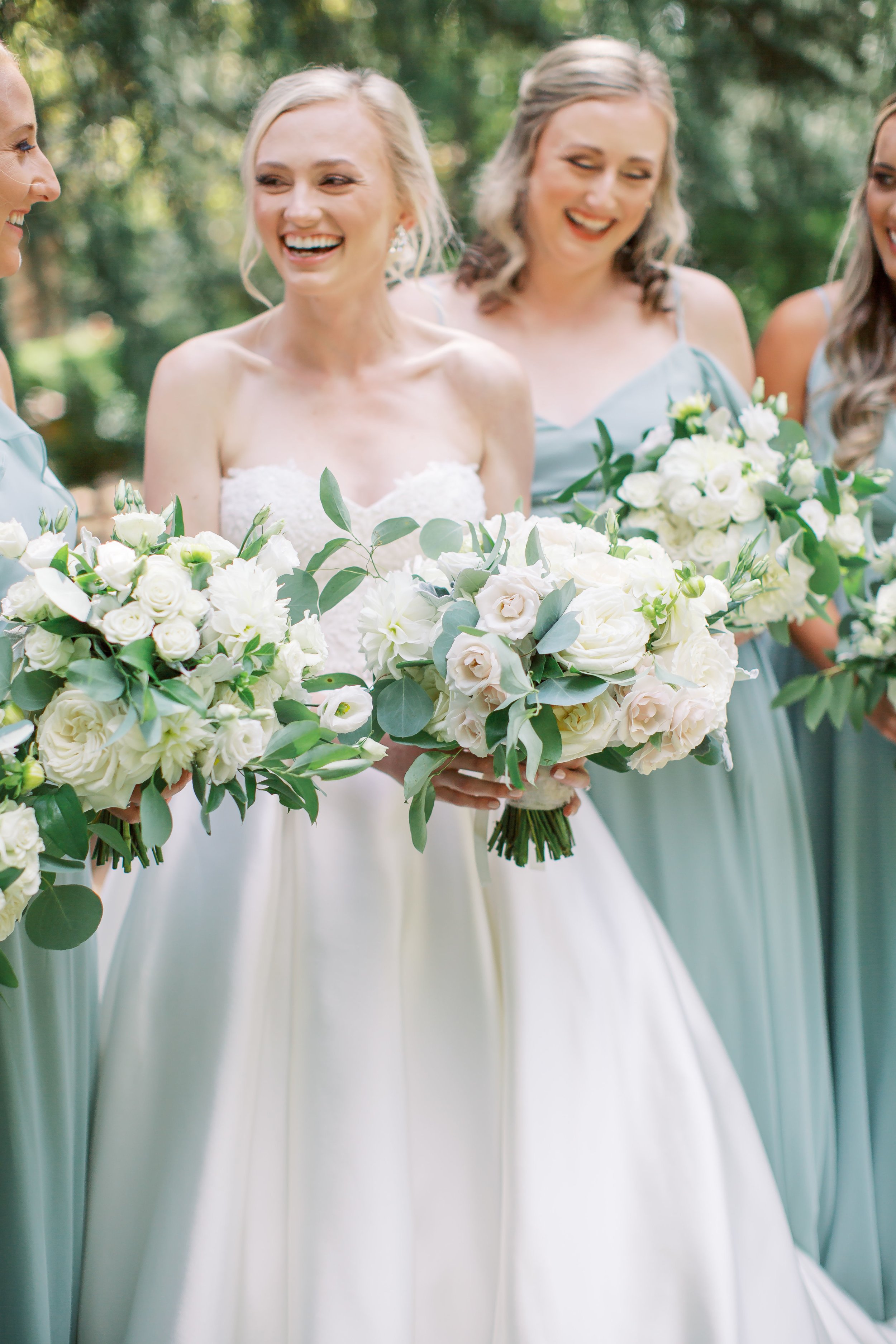 Bride with Bridesmaids green dresses