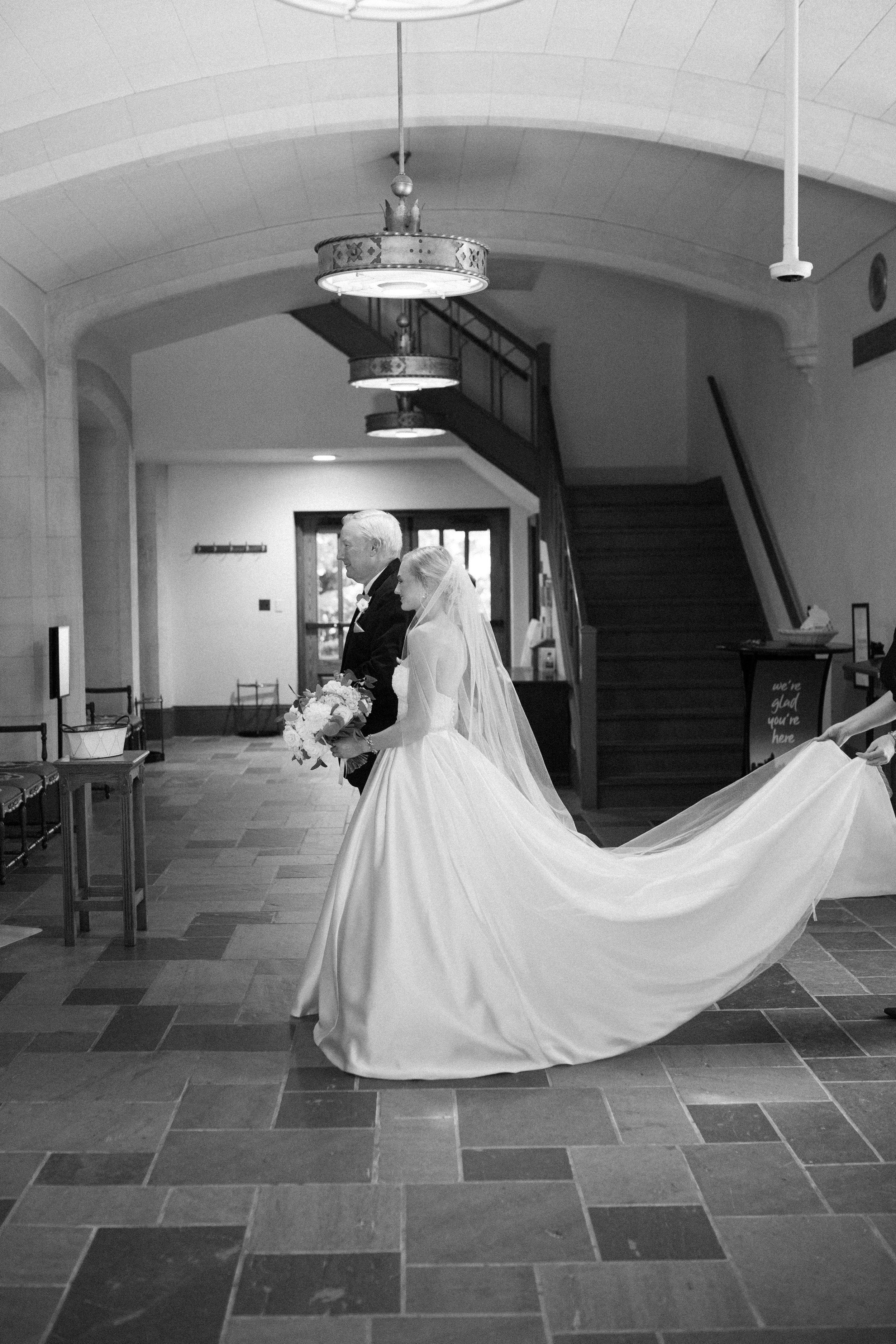 Bride walks down aisle with dad at church in charlotte, nc