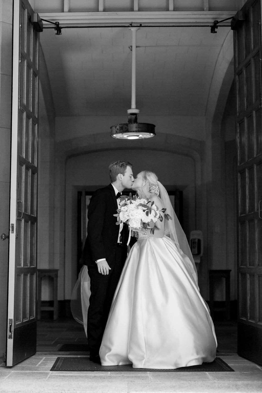 Black and white bride and groom just married portrait