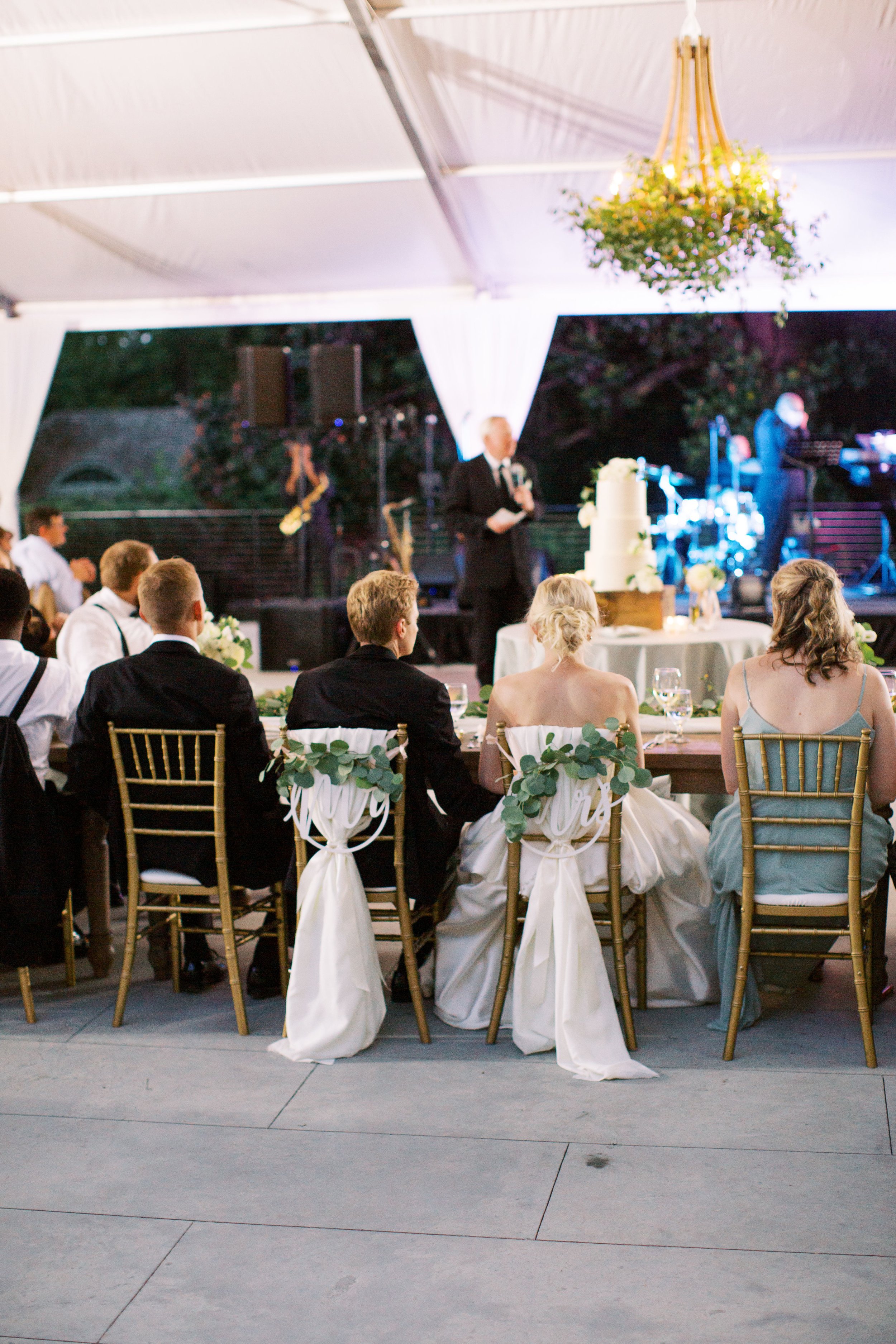 bride and groom during speeches at venue in charlotte, nc