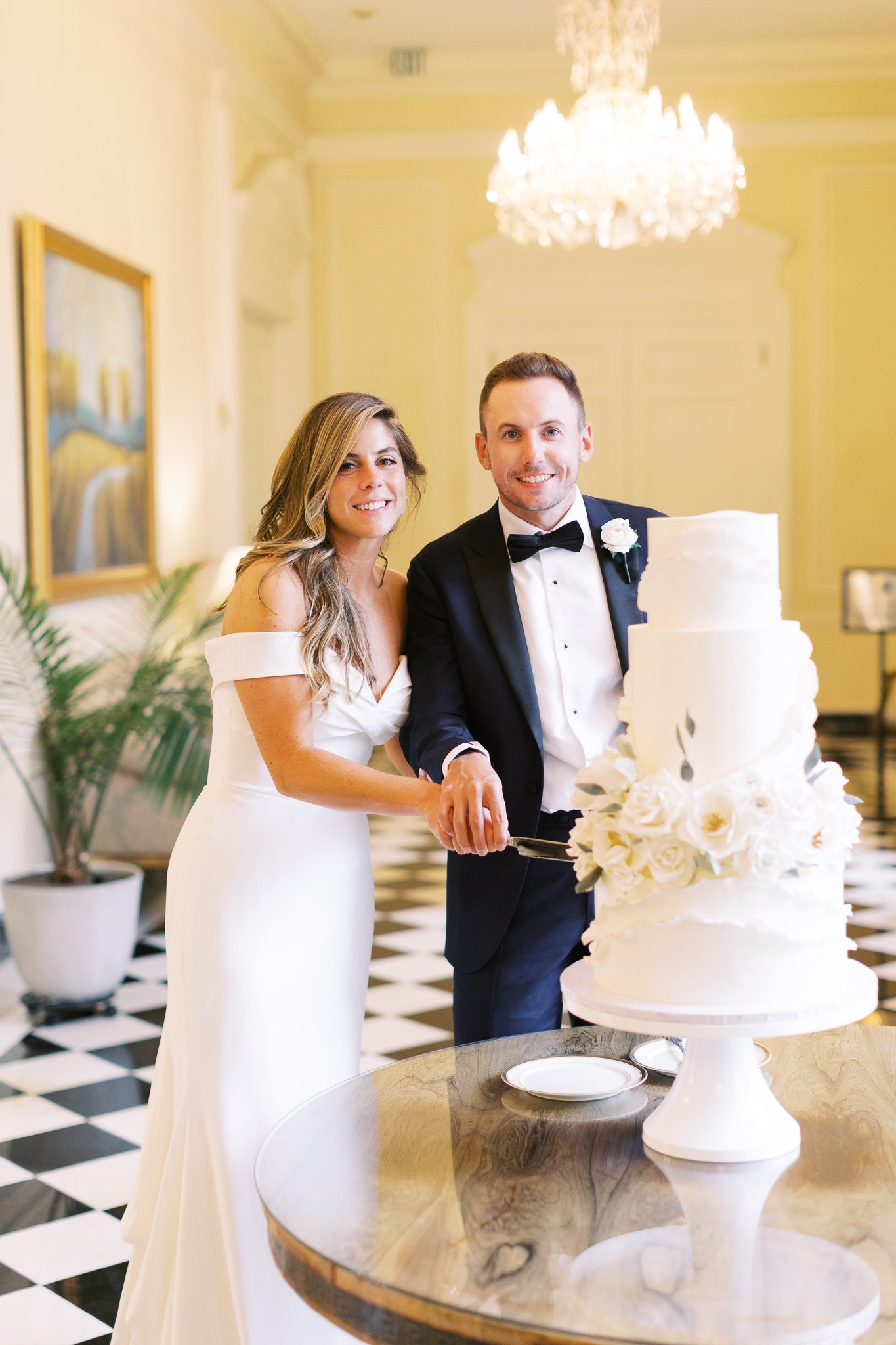 Bride and Groom cut cake at Duke Mansion