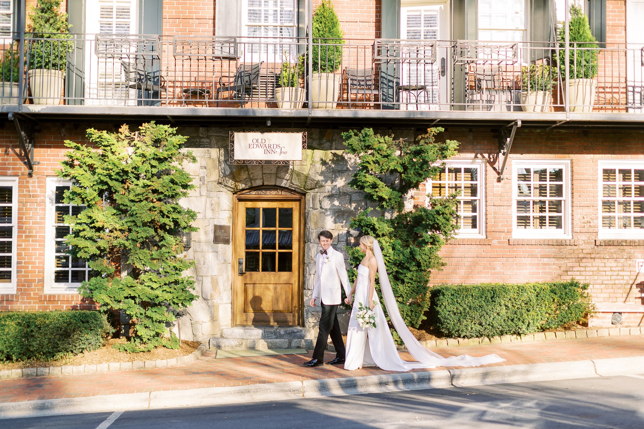 Bride and Groom walking at Old Edwards Inn