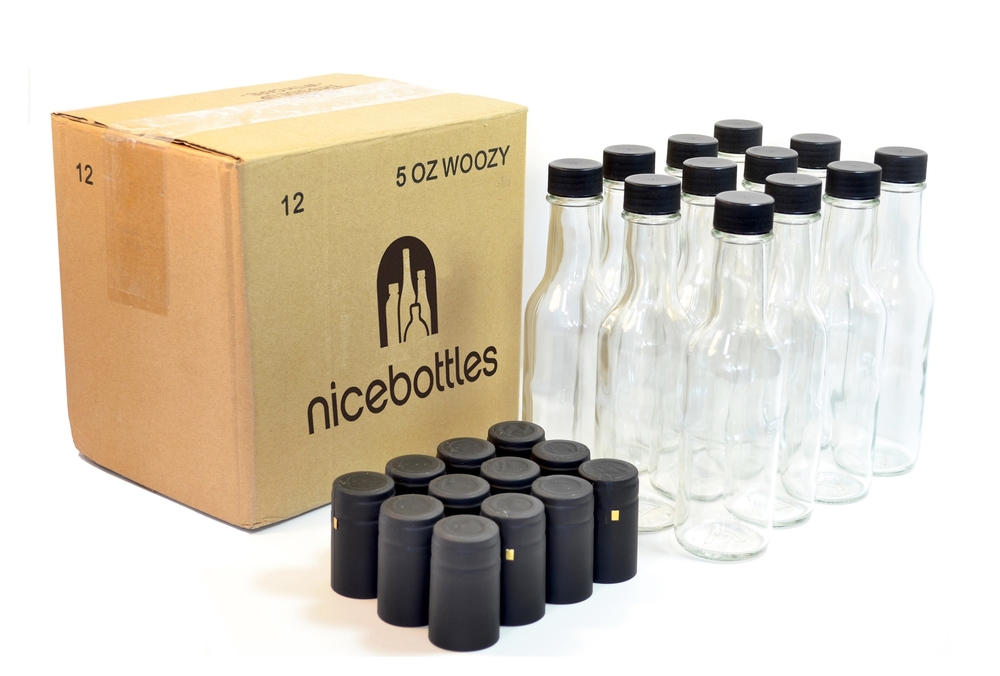 Clear Glass Woozy Bottles, 5 Oz with Red Caps and Shrink Bands — nicebottles