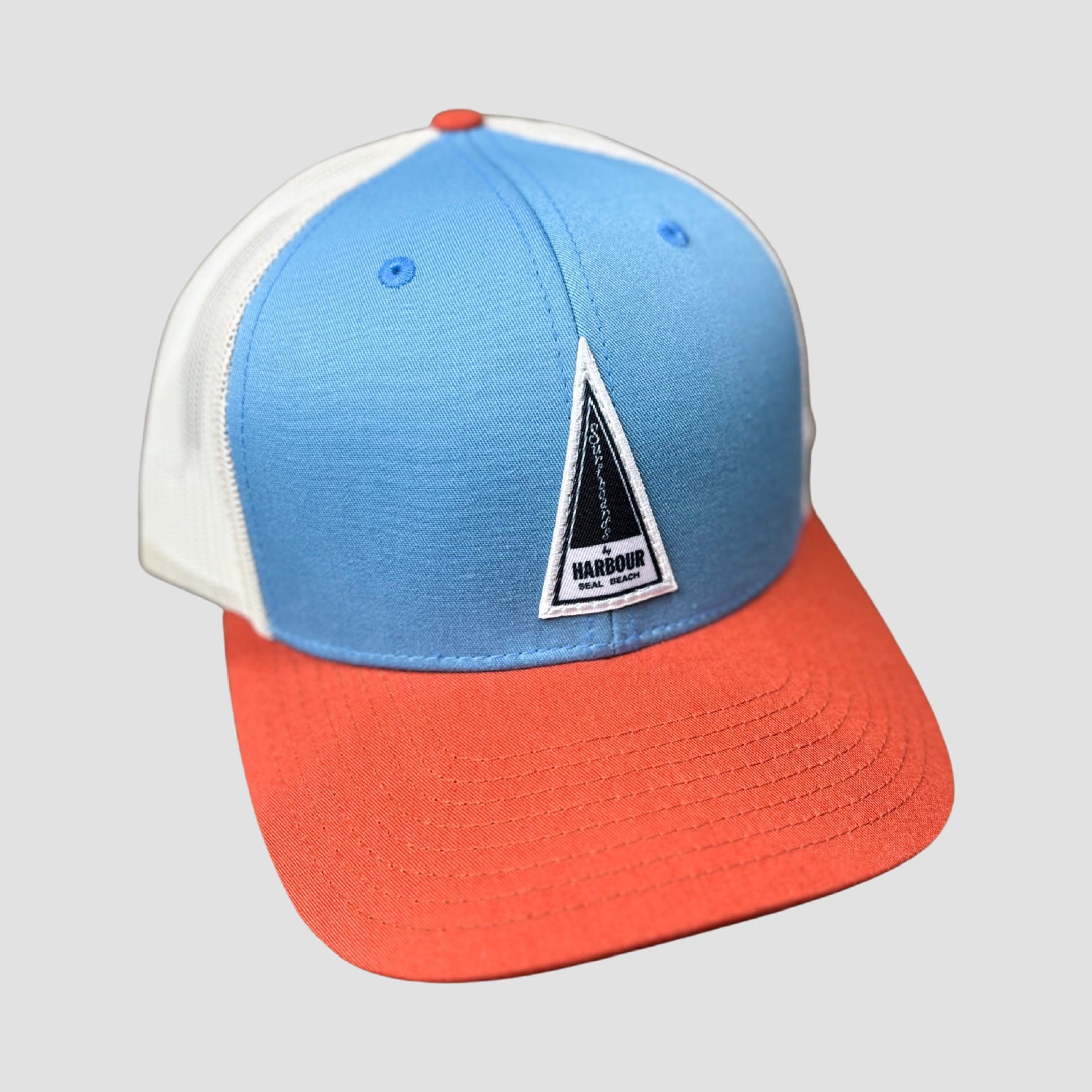 Triangle Trucker - Columbia blue/Burnt Orange