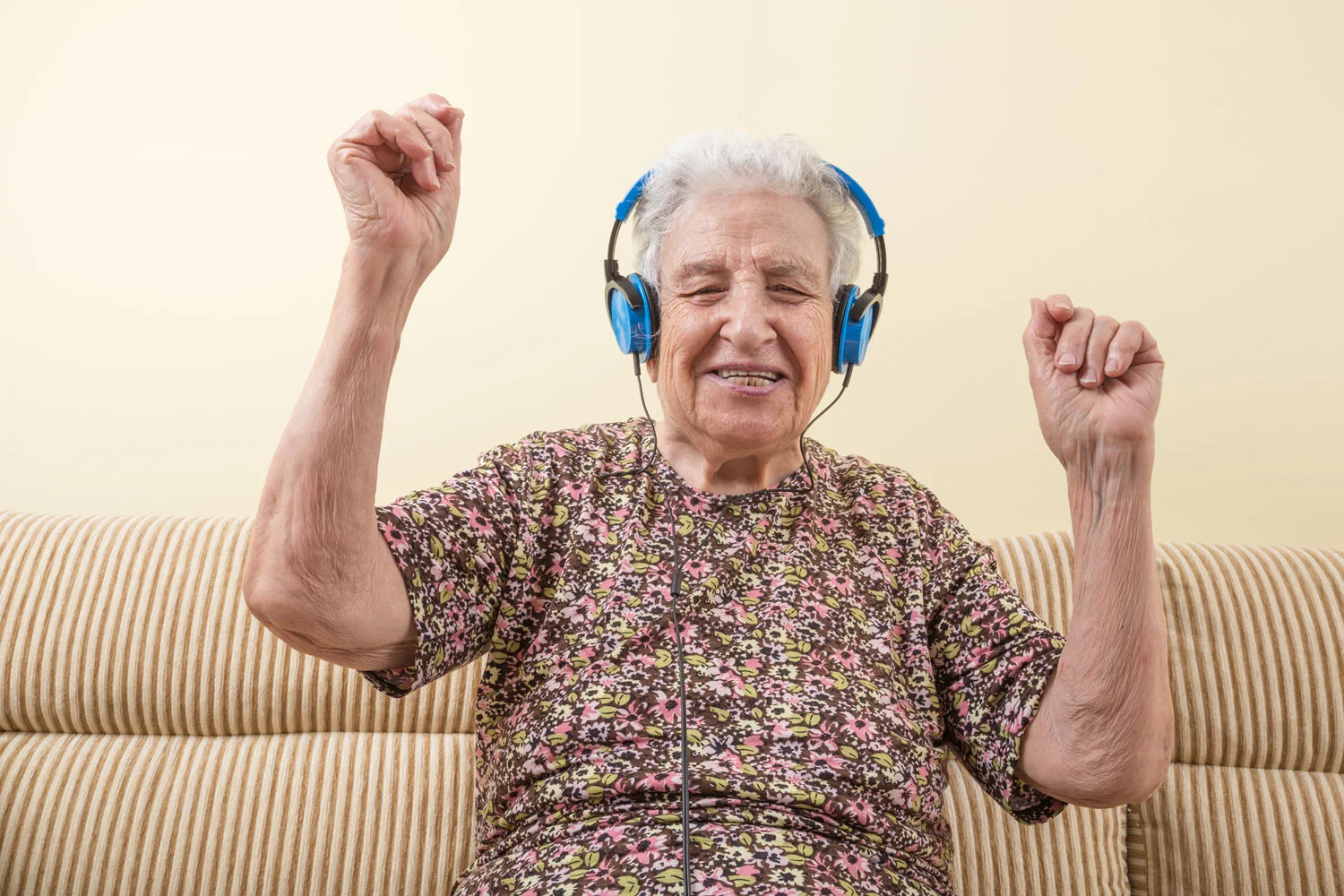 Grandma dancing to tunes with her blue headphones! bella magazine Australia 