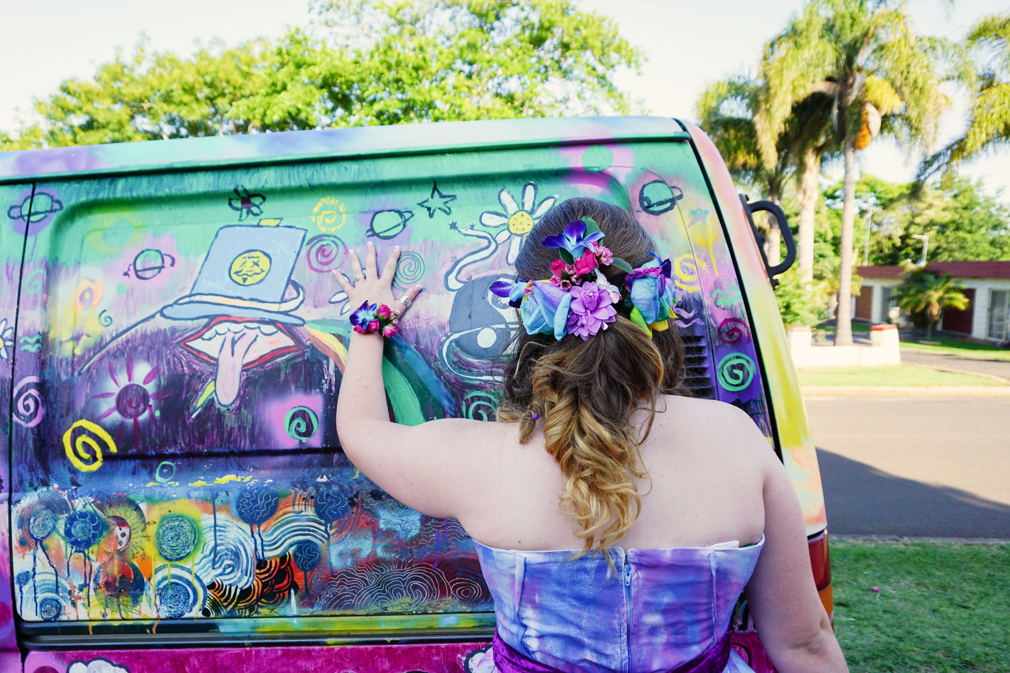 Stunning girl with graffiti van ready for formal.