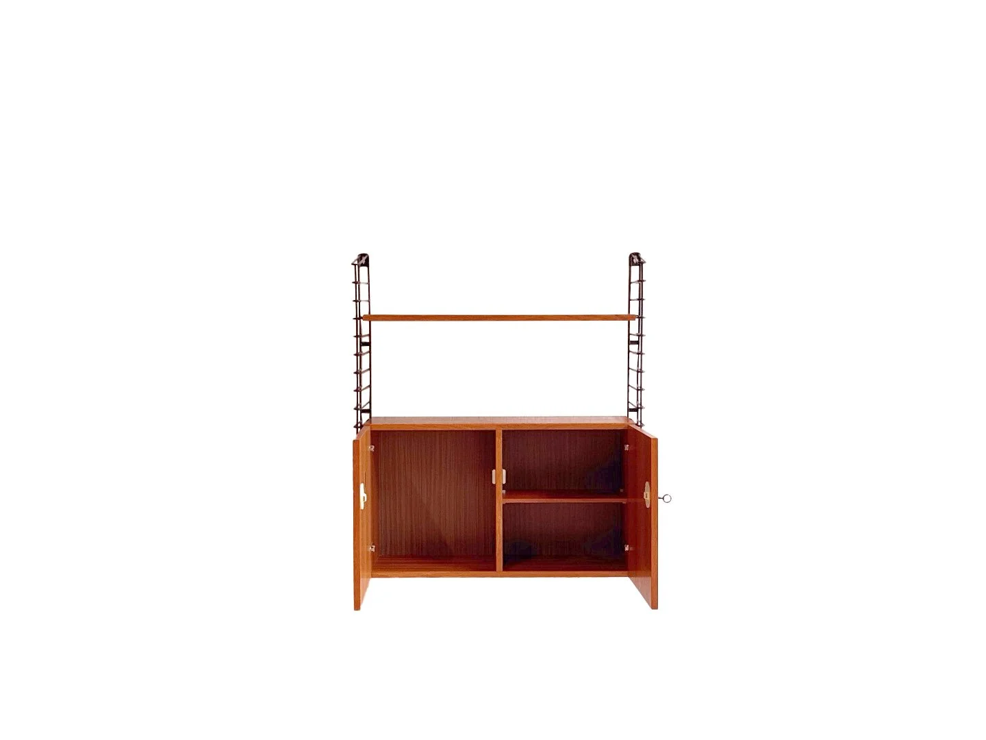 Vintage Musterring wall system in wood – cabinet doors open to reveal storage space