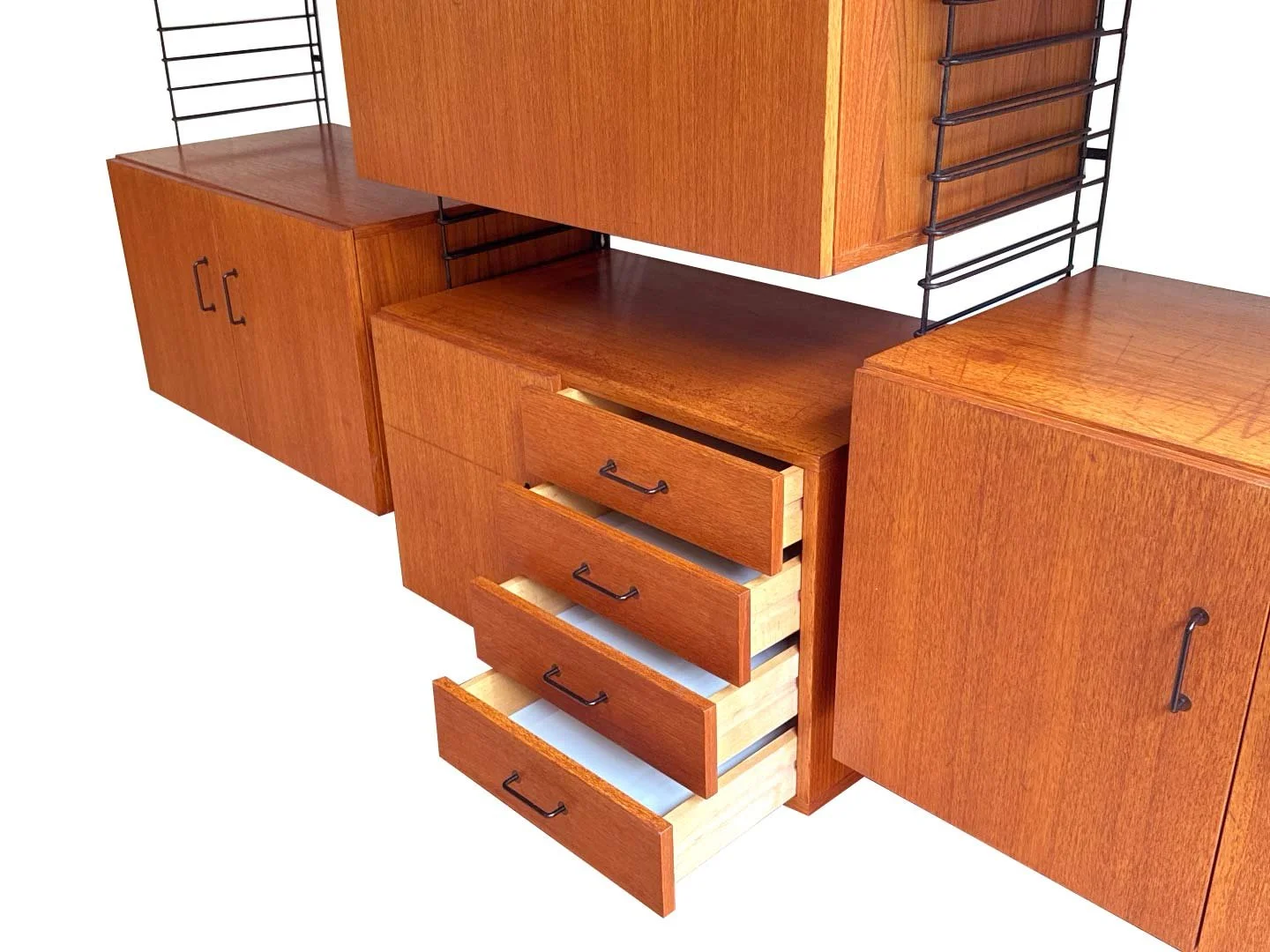 Musterring teak wall unit – close-up of cabinet with drawers open