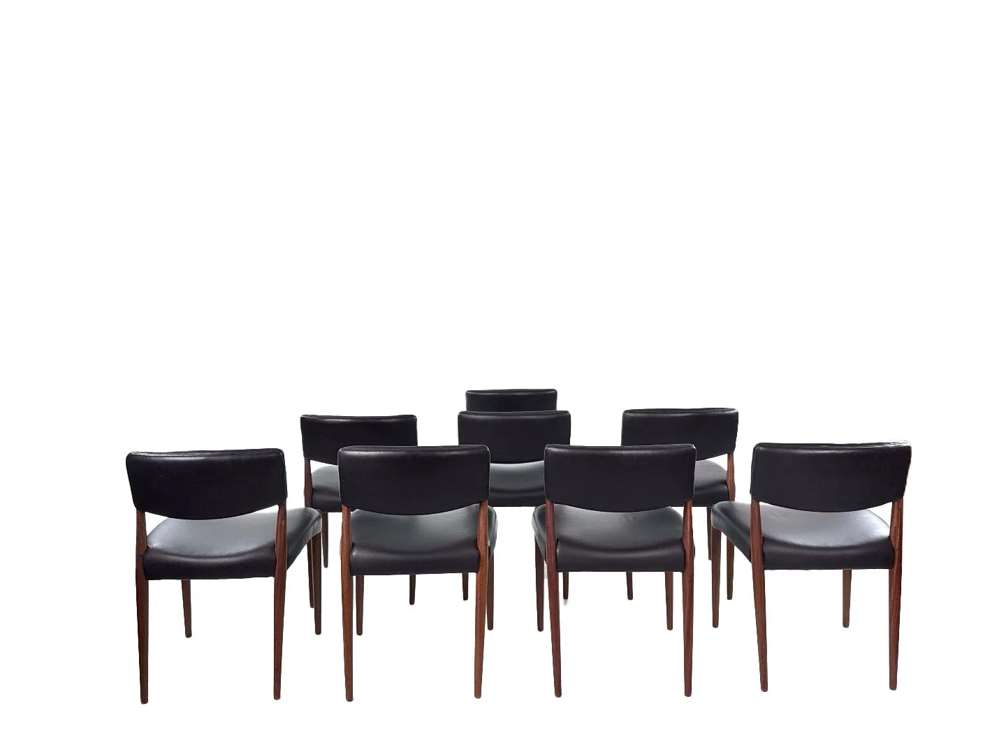 Set van 8 Deense teak stoelen van Aksel Bender Madsen & Ejnar Larsen in teak – achteraanzicht vintage set.