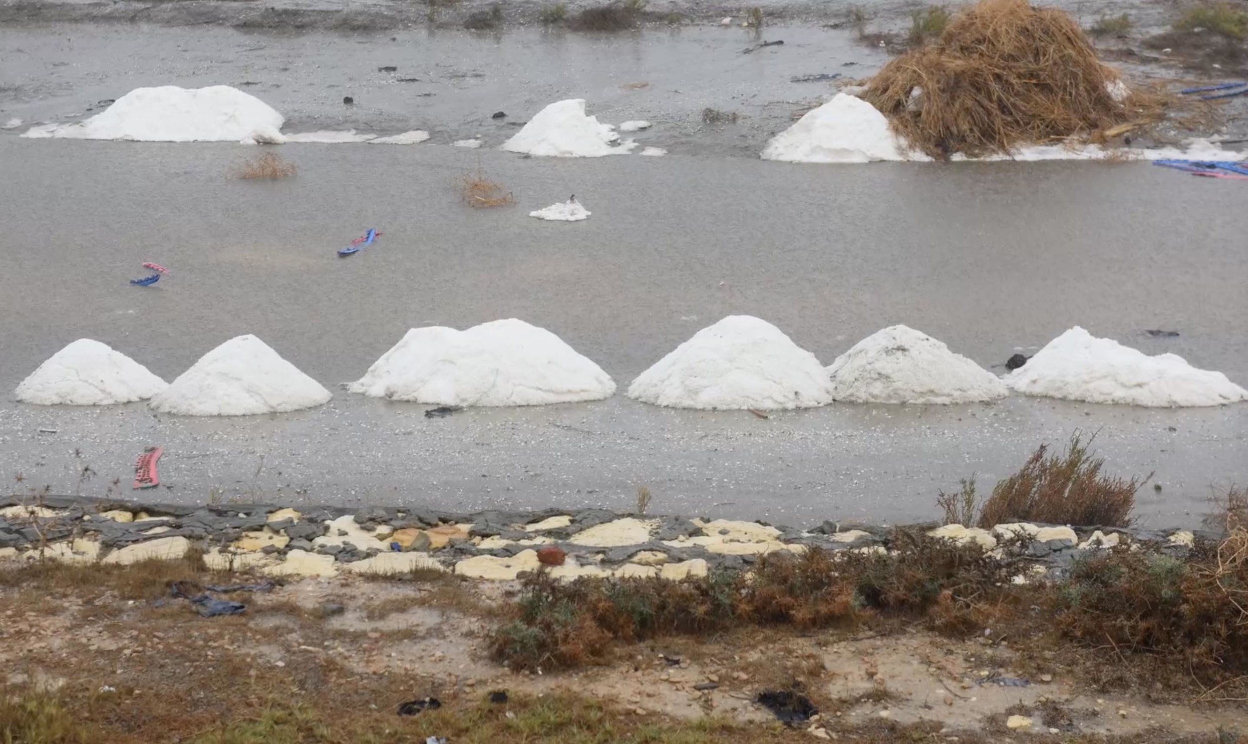  Piles of salt resulting from the evaporation of salty groundwater in the Nile Delta areas  
