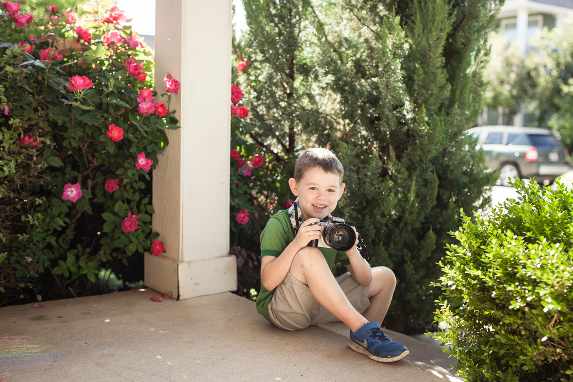 Sam Straka, age 6, practicing his photography on the front patio.&nbsp;