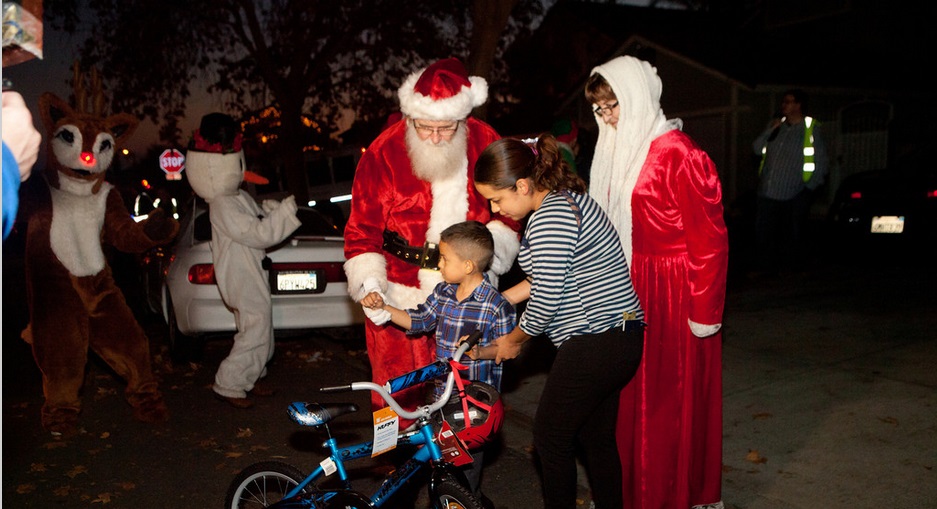 Holiday Giving Program The Holiday Adoption program provides food including a holiday meal, clothing, hygiene aids, school supplies, and of course toys to the needy families of the City of Jurupa Valley. We join Santa Claus in delivering the items to selected families over several days just prior to Christmas. Families are chosen only after meeting strict eligibility guidelines. Since its inception, we have supported over 1,300 families and brought holiday cheer to tens of thousands of children. 2016 Recap Families with full adoption - 90 Senior Citizens with full adoption - 400 Number of children who received toys because of our program - Over 8,500 In all, we filled over 2,200 grocery bags with food, cleaning supplies, hygiene items, and other general household necessities. Children in each of the adopted families received school supplies as well. We provided bicycles and helmets to numerous children and were able to fulfill some special needs. This program would not be successful if it were not for the help of the wonderful community it serves, our family and friends, and each of you who donated time, money, or merchandise. Thank you for all you have done and we look forward to helping even more children in 2017.