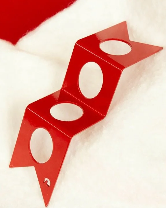 2 different ornaments :

Ribbon was designed to be threaded all the way through by a single branch, or just hang off of one hole like a normal ornament.

The Super Cool Icicle Ornament is a take on more traditional decorations that I grew up with. Th