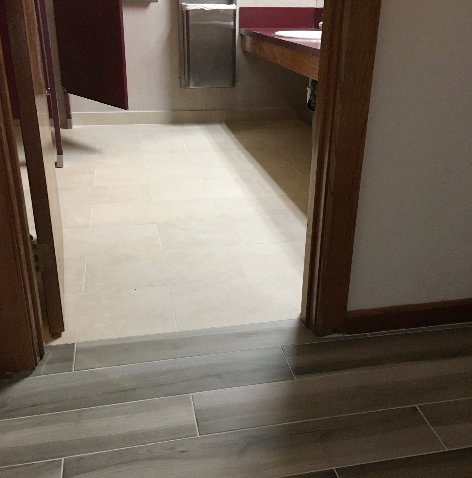New 12" x 24" bathroom tile complements the lobby tile.