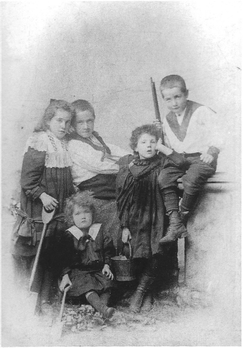 Kathleen Boland (left) with her siblings, including Harry (right)