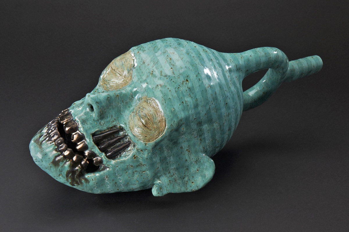 Cadaver Stirrup , 2010; Ceramic, glaze, frosted paint; 18 x 9 x 9 inches