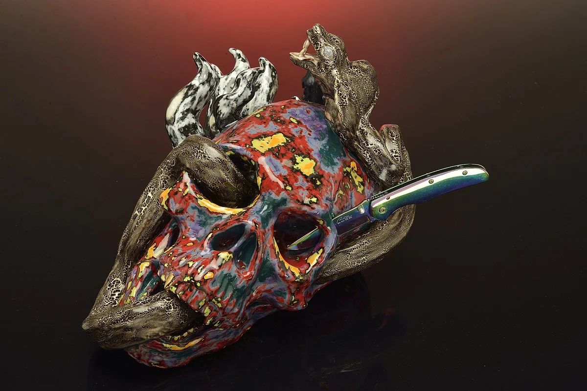 Motorbreath , 2014; Ceramic, glaze, galvanized knife; 18 x 10 x 12 inches
