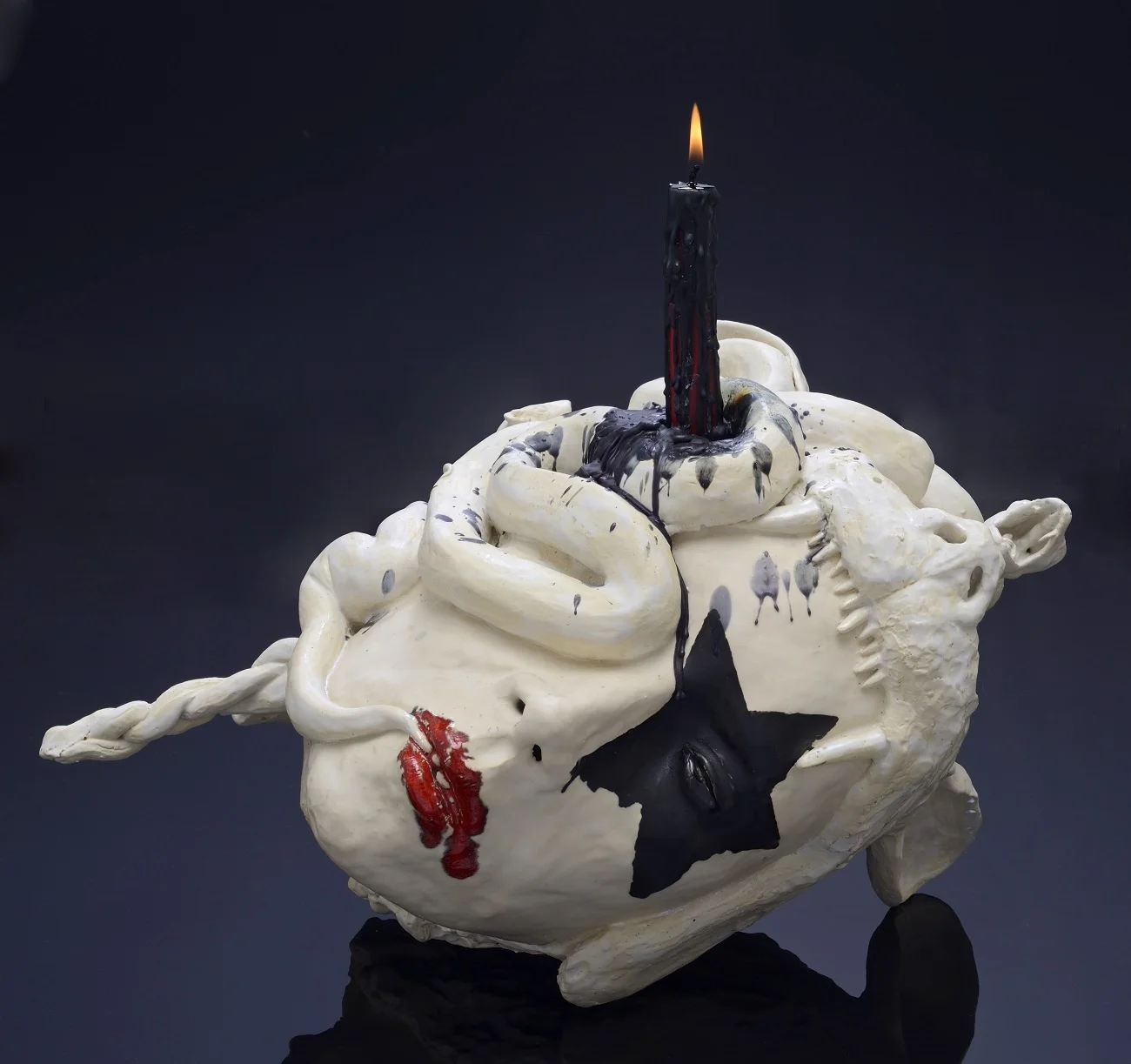 Lick It Up , 2011; Ceramic, glaze, candle; 15 x 18 x 13 inches