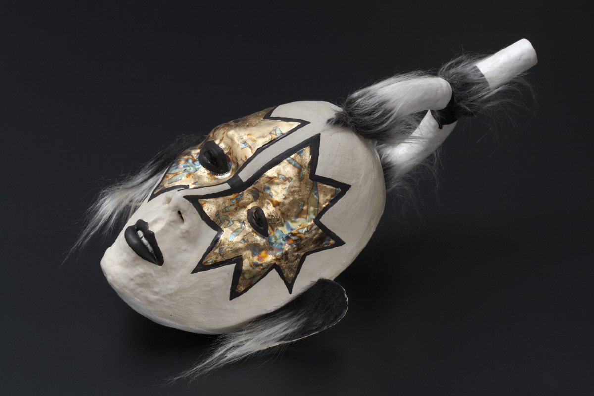 Black Diamond , 2010; Ceramic, glaze, faux fur, leaf; 20 x 9 x 9 inches