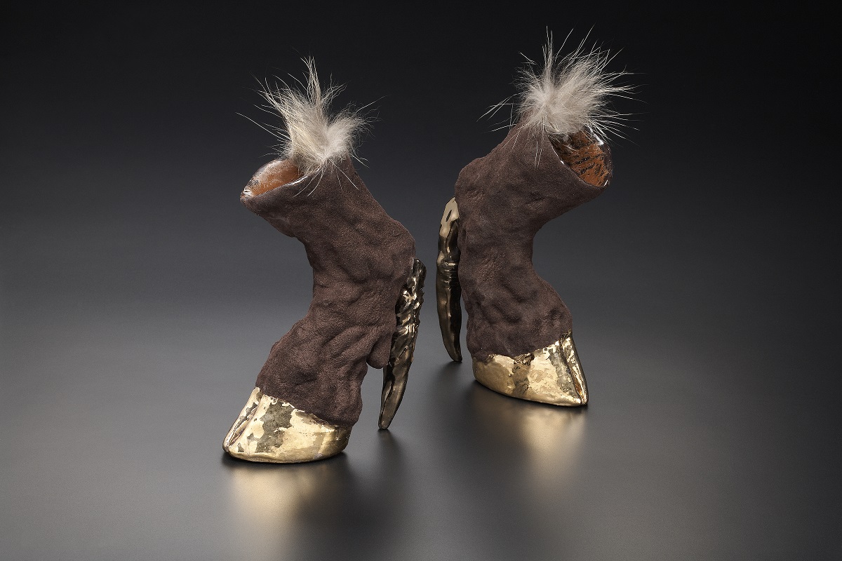 Hoof Heels , 2010; Media: Ceramic, glaze, luster, flock, fur; 14 x 11 x 12 inches (per pair)