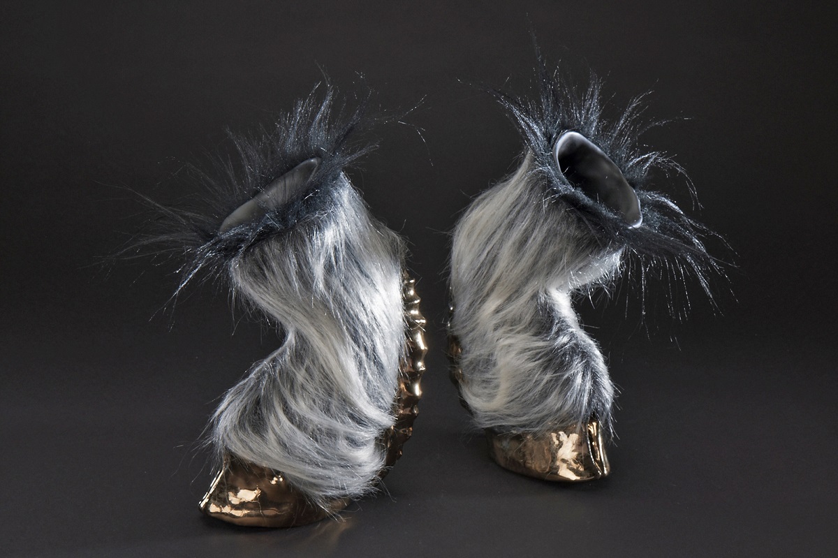 Hoof Heels (for Winter) , 2011; Media: Ceramic, glaze, luster, faux fur; 14 x 11 x 12 inches (per pair)