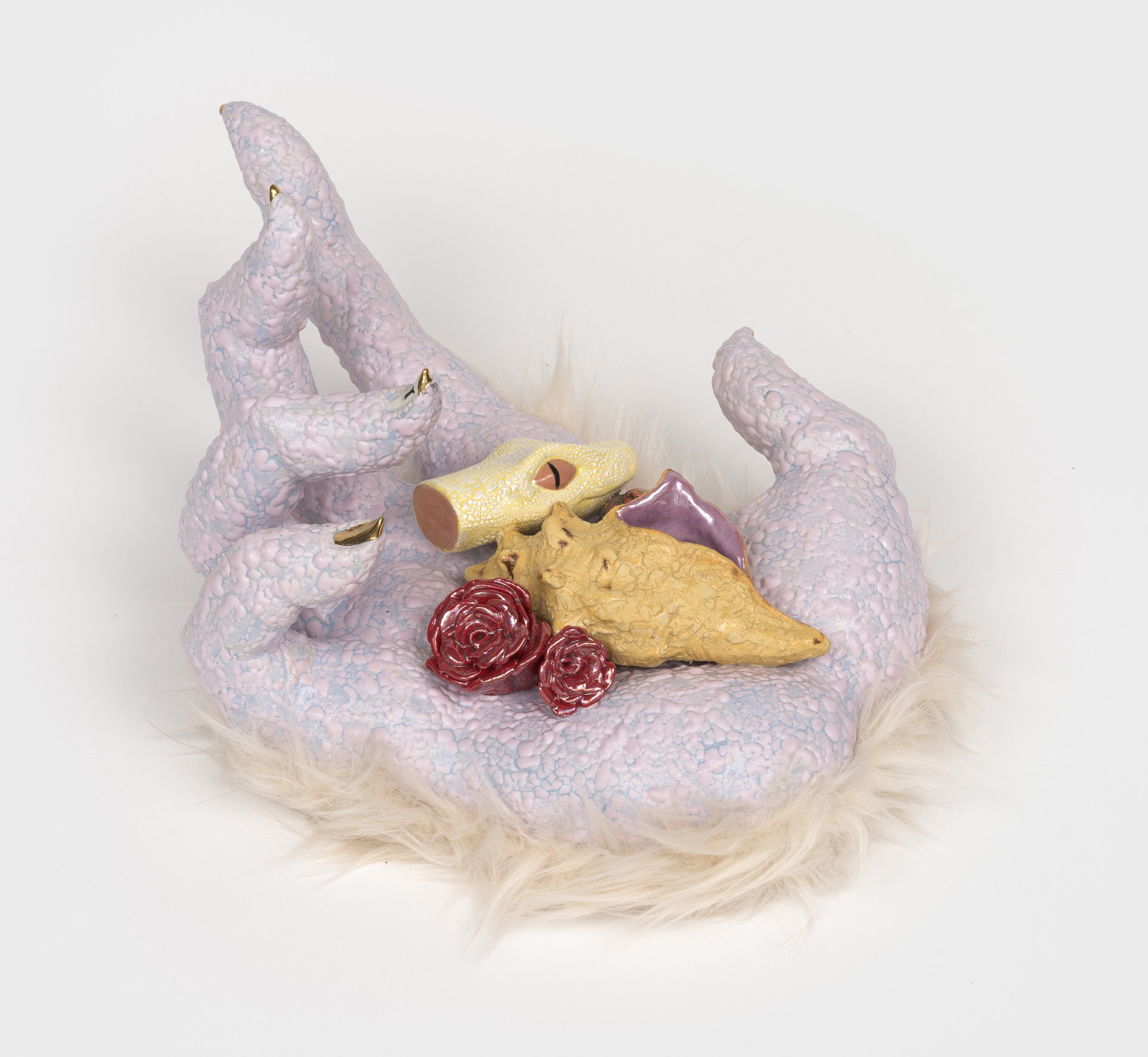   Candie  2025. Ceramic, glaze, luster, faux fur; 16L x 7.5H x 10.5D inches 