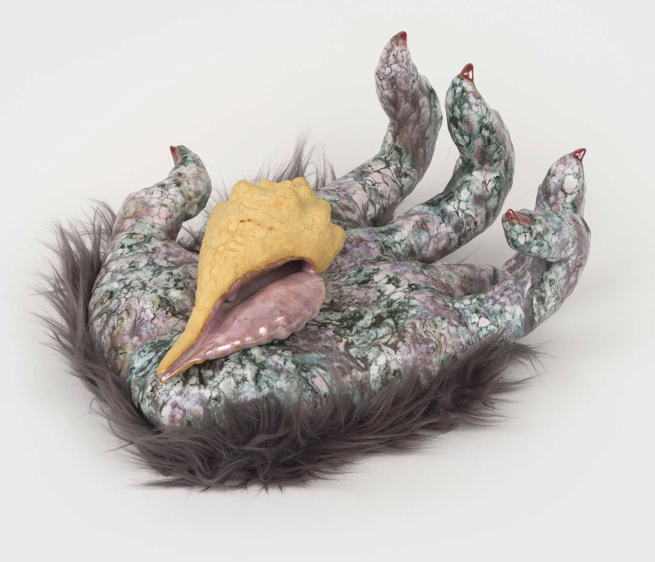   Nephilim  2026. Ceramic, glaze, luster, faux fur; 14L x 7H x 10.5D inches 