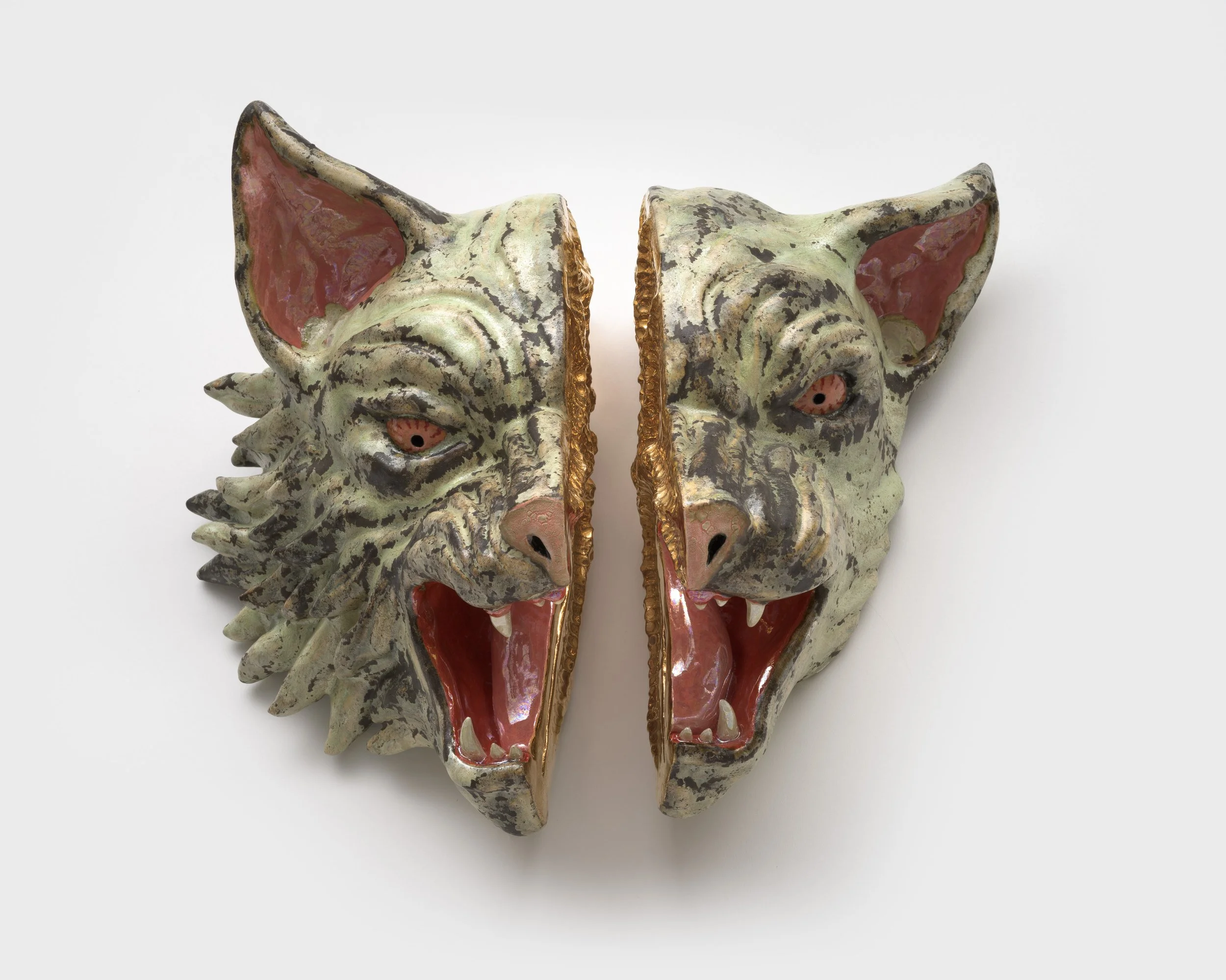   Split Feline  2026. Ceramic, glaze, luster; 15L x 12.5H x 7D inches 