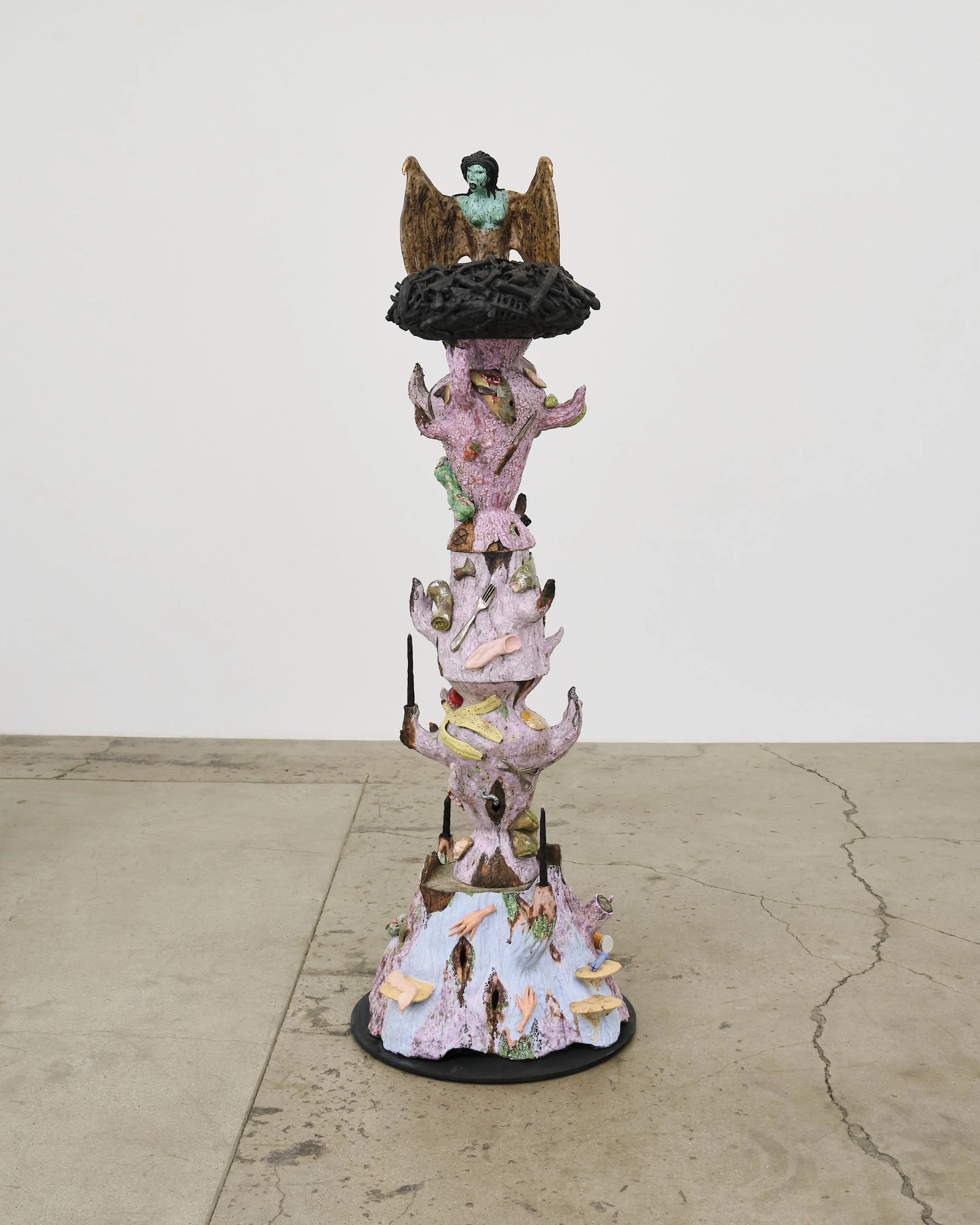   Harpy Candelabra ,   2026. Ceramic, glaze, luster, steel base, carved black candles; 30L x 84H x 30D inches 
