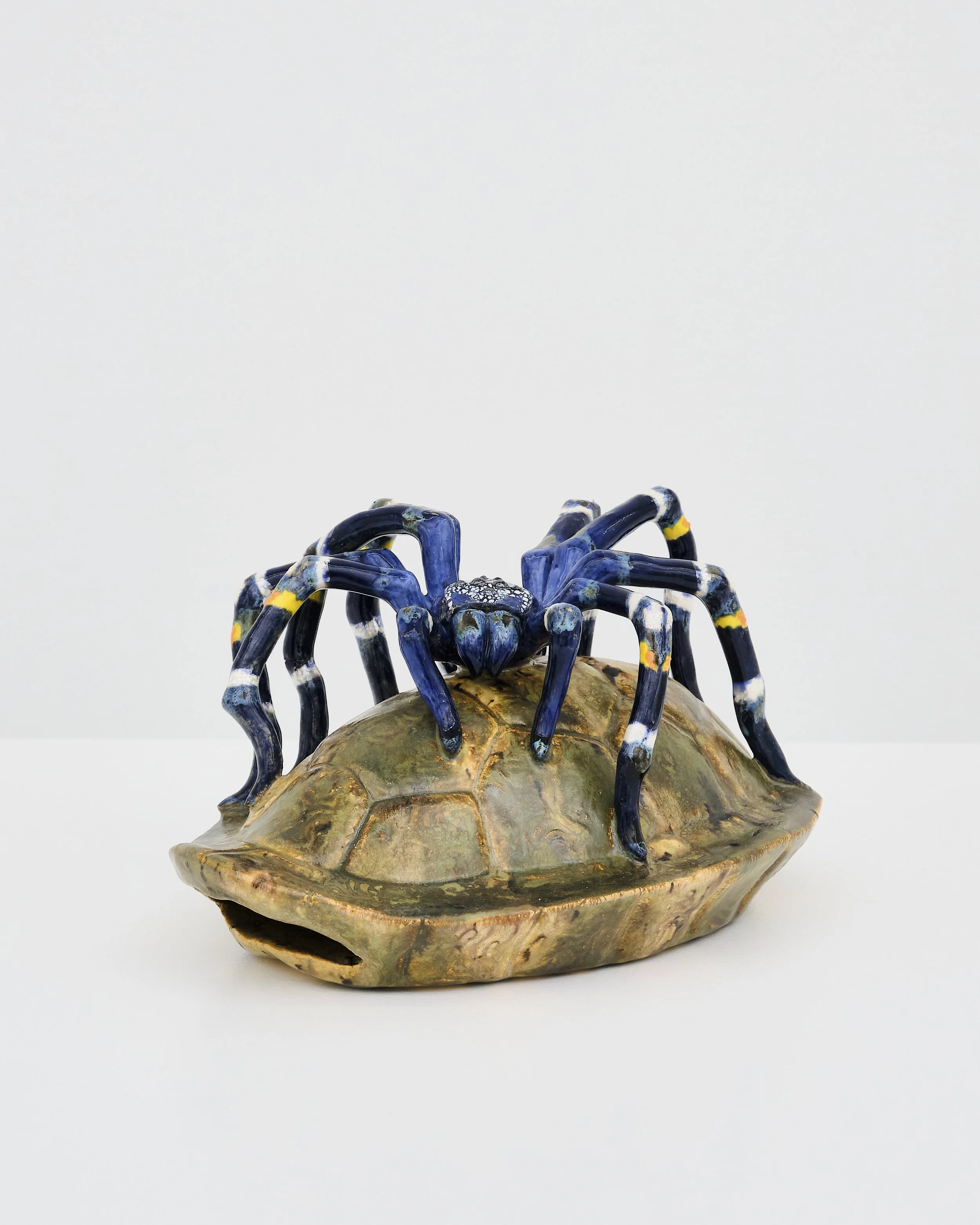   Earthtiger  2026. Ceramic, glaze, luster; 8L x 7H x 5D inches 