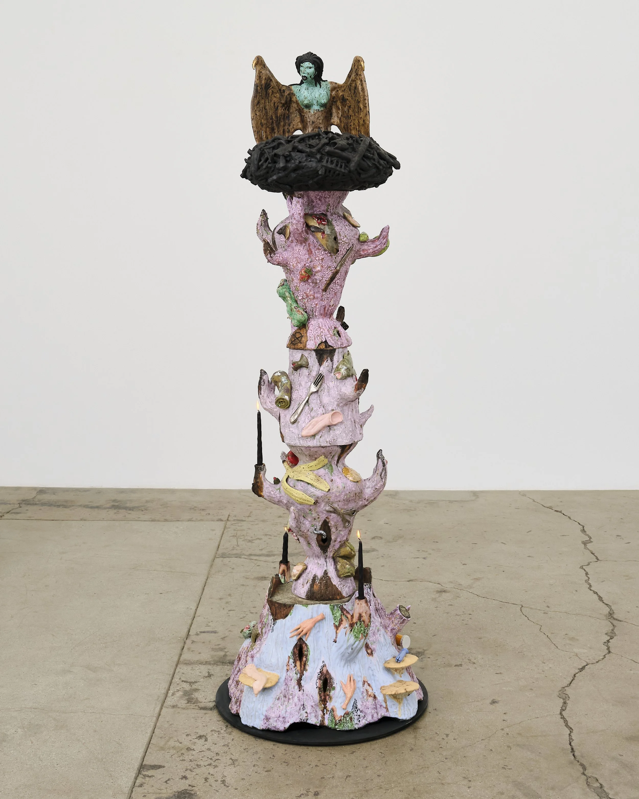   Harpy Candelabra ,   2026. Ceramic, glaze, luster, steel base, carved black candles; 30L x 84H x 30D inches 