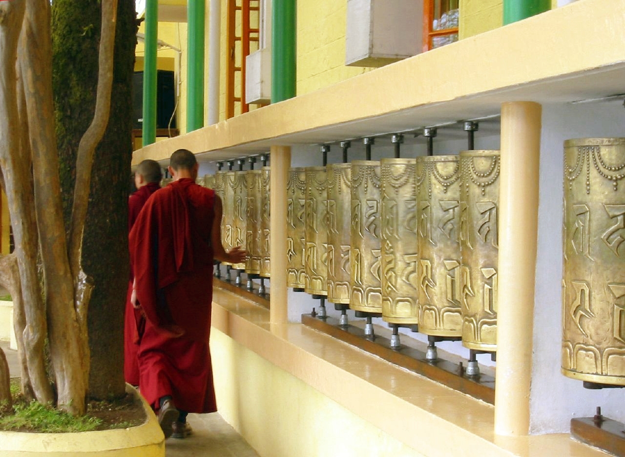 Prayer_Wheels_at_Tsuglagkhang_Temple,_McLeod_Ganj.jpg