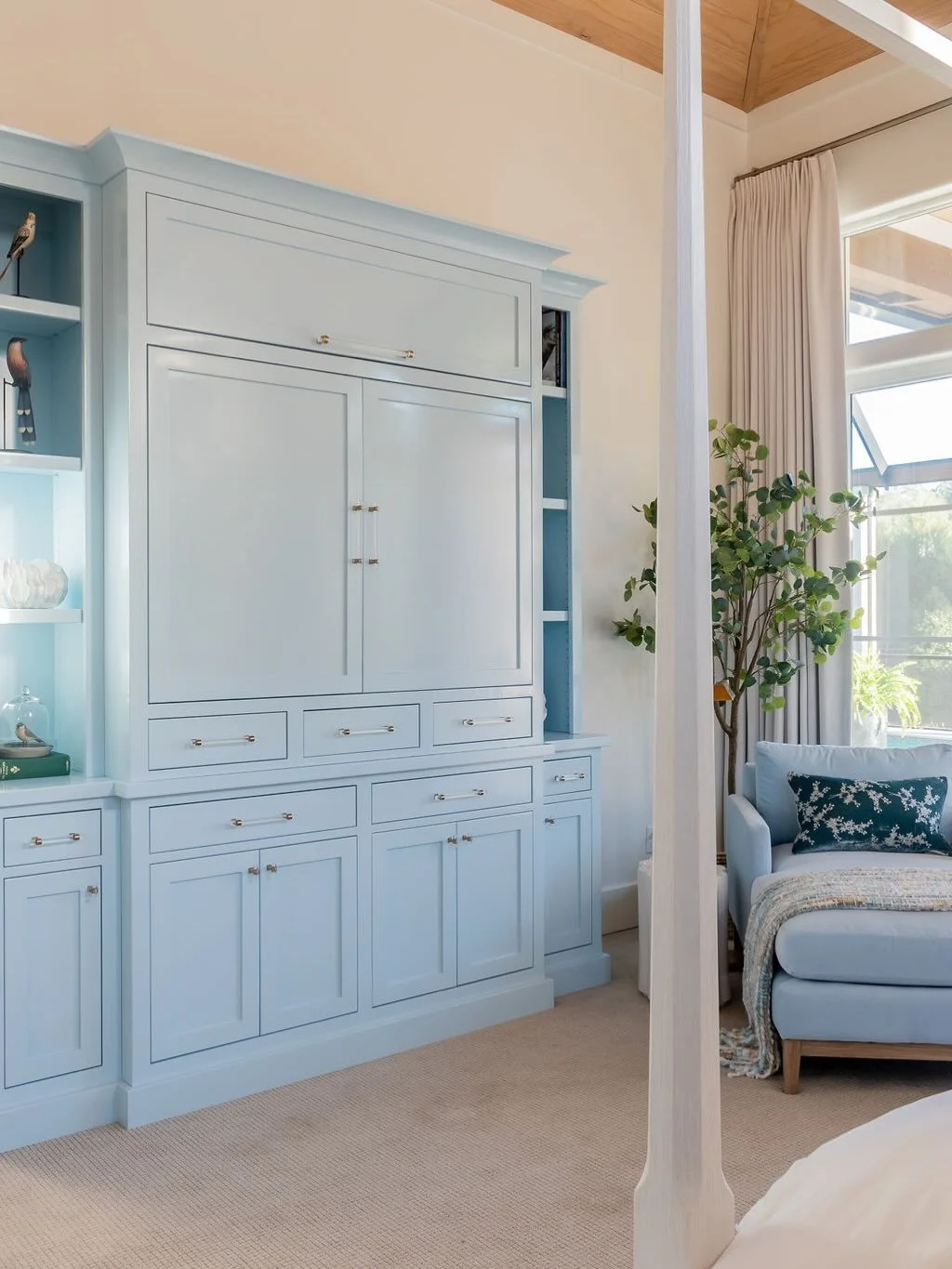 Cabinets aren&rsquo;t just for kitchens and bathrooms. This custom-built piece hides a TV, printer, and work supplies. ✨
