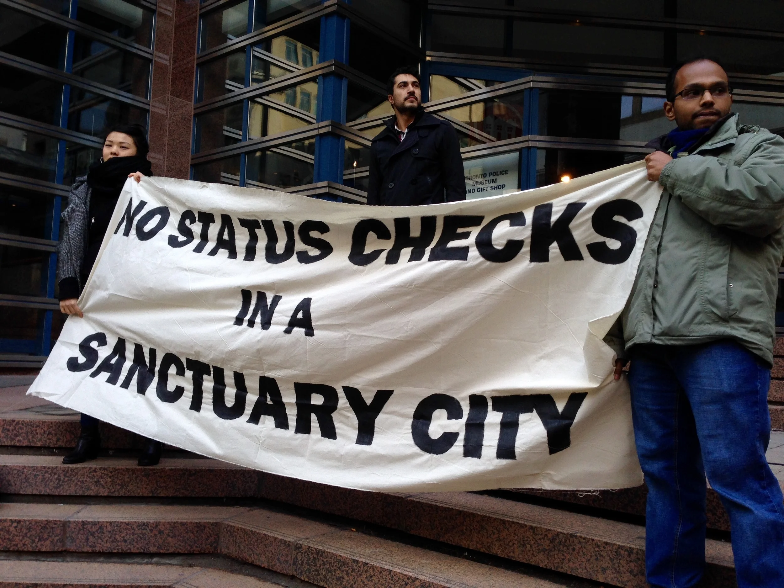   No One Is Illegal protests outside police headquarters in December 2015  . (Published by   NOW Magazine  , February 11, 2016)  