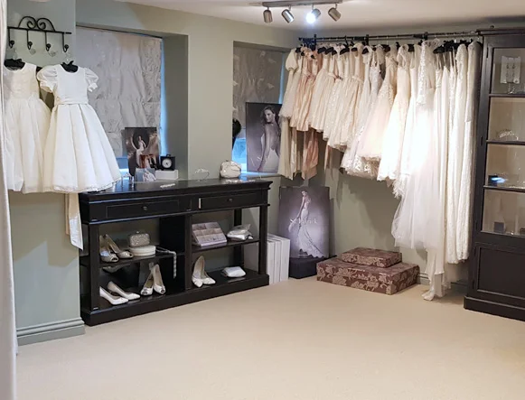 Our second large room is down a flight of stairs, we often use this room for dress fittings as there is plenty of space to move around and it is very private. There is also a selection of accessories and sale dresses in this room.