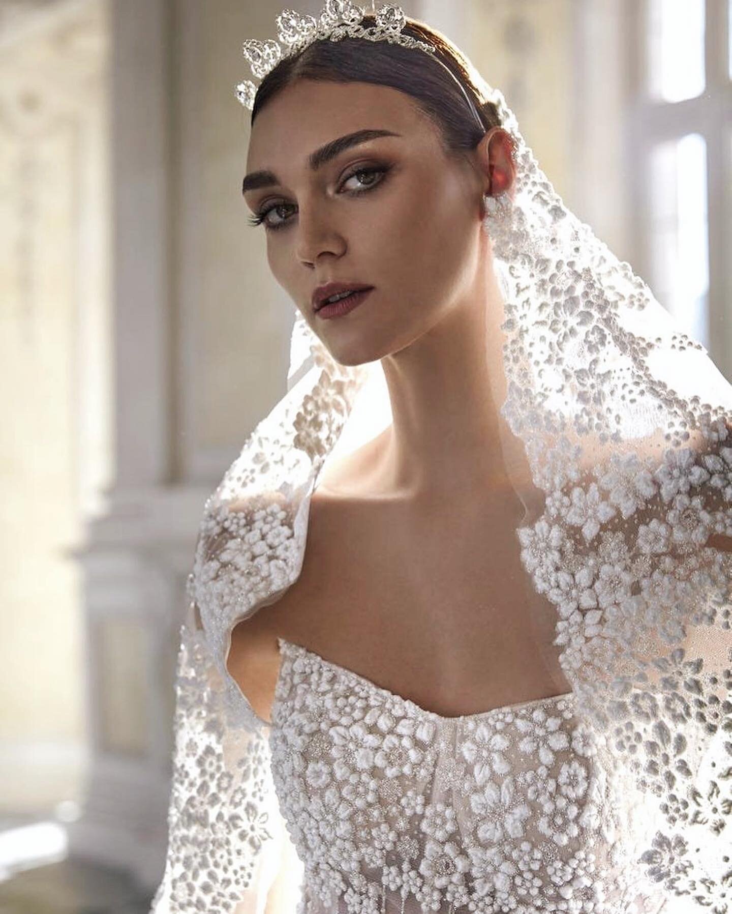 How stunning are the embellished details on this strapless A-line dress! This dreamy gown has an inner corset built in, ensuring a perfect fit for your special day. The embroidery showcases a beautiful blend of floral and geometric designs, giving th