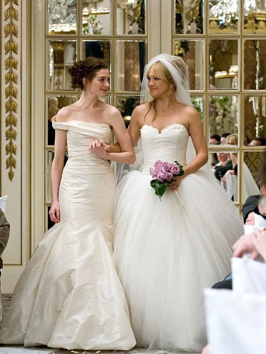 Ladies, who remembers the iconic gowns from the classic rom-com Bride Wars worn by Anne Hathaway and Kate Hudson? Two brides, two unforgettable styles - the stunning classic ballgown or the sleek, curve-hugging mermaid.

Which dress makes you feel li