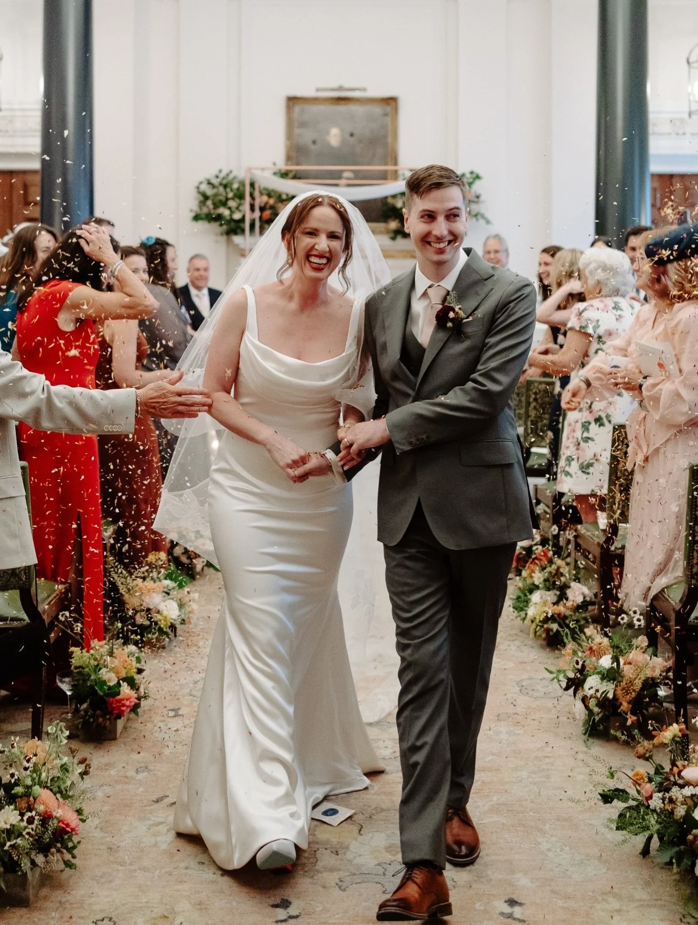 Did you know we create made-to-measure, in-house designs from scratch? We had the pleasure of creating this gown for Stephanie, a crepe back satin gown from our in-house collection, with the neckline adapted especially to suit her.

Congratulations t