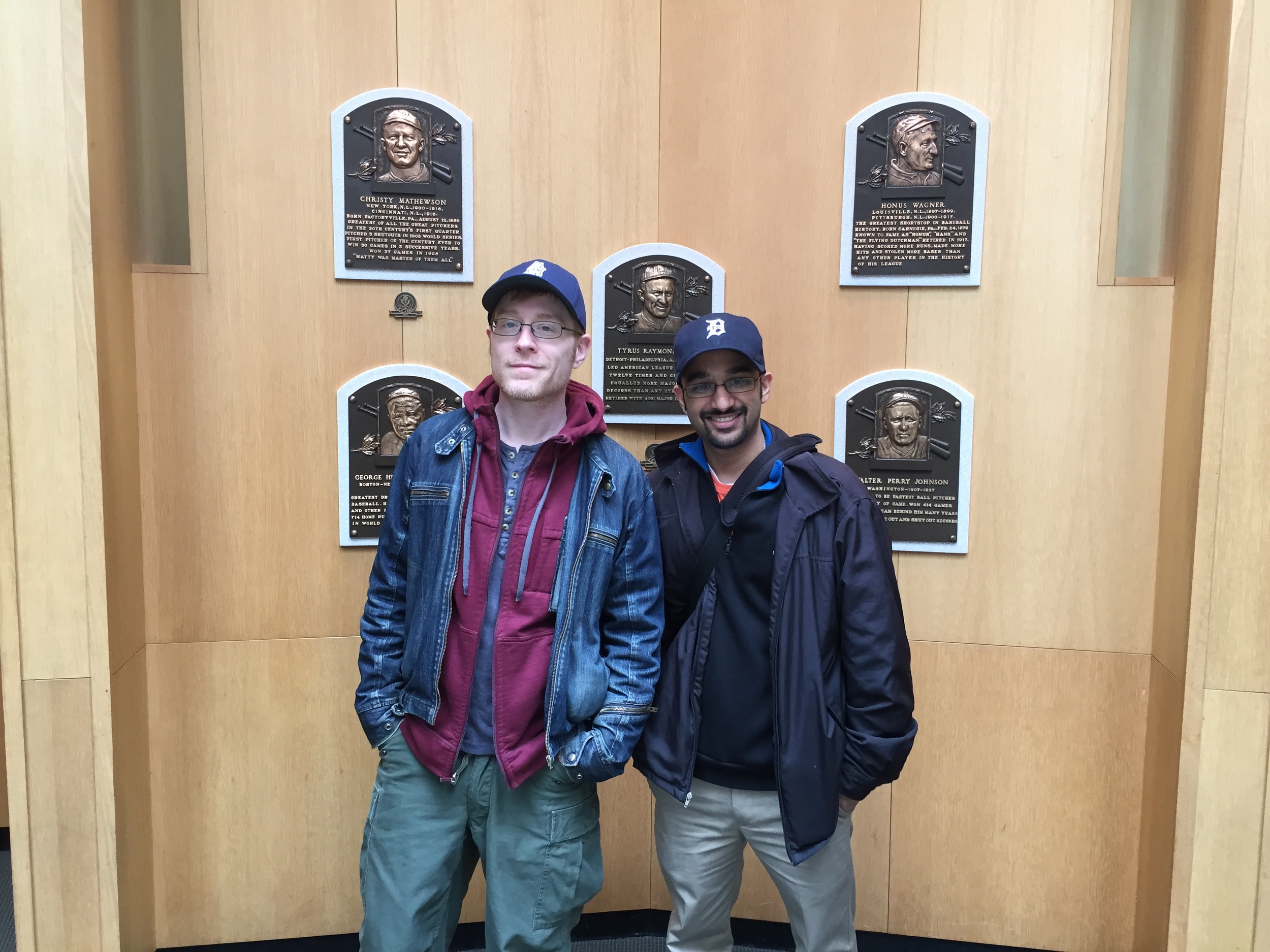  Anthony and Muneesh in front of the first Hall of Fame class' plaques. 